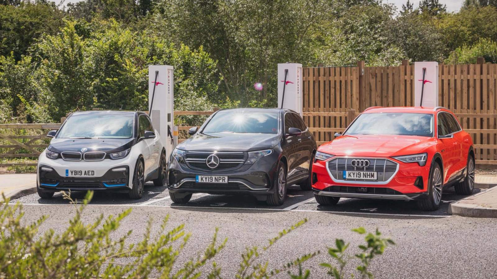 Three EV models charging at an Ionity charging station