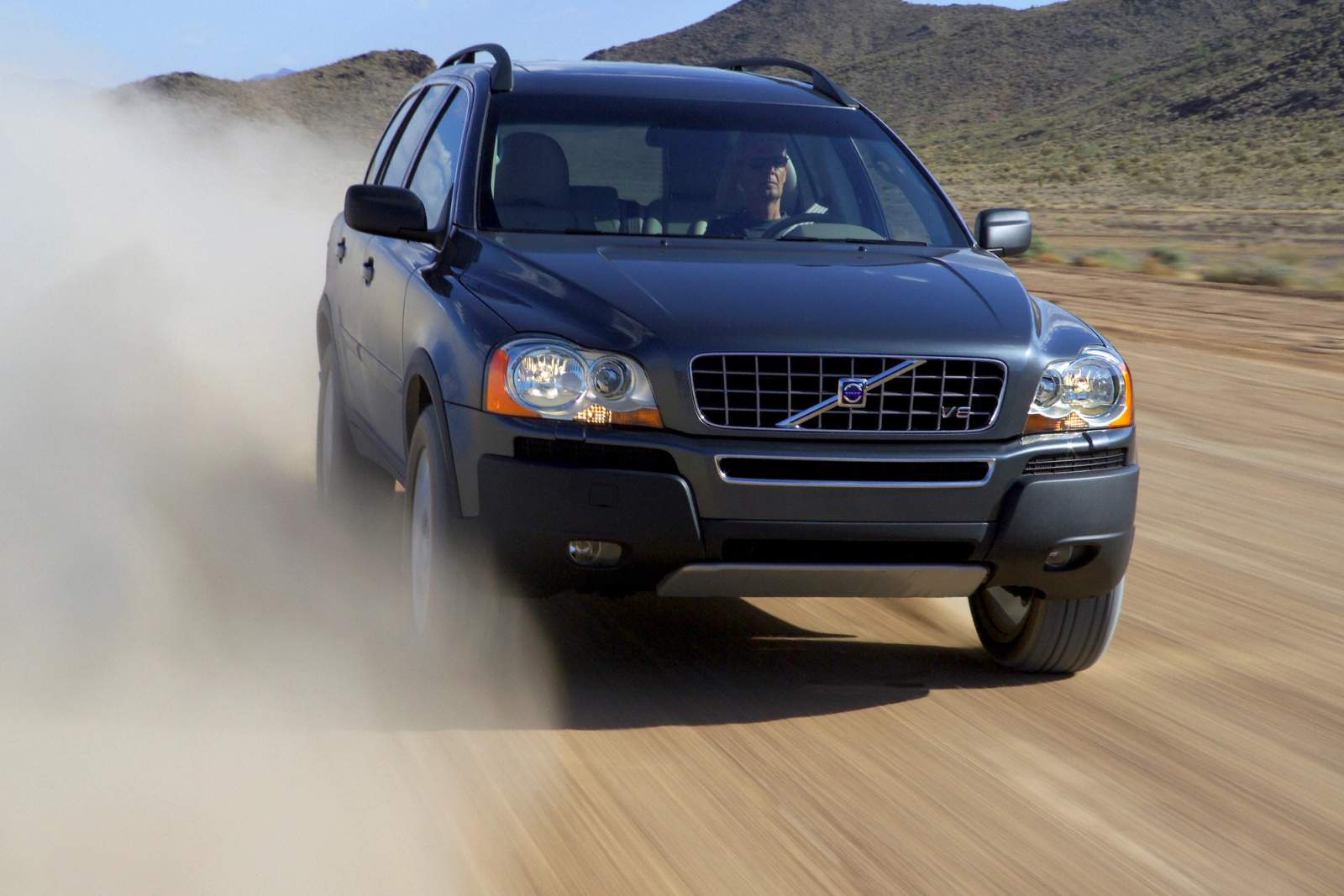 black car on dirt