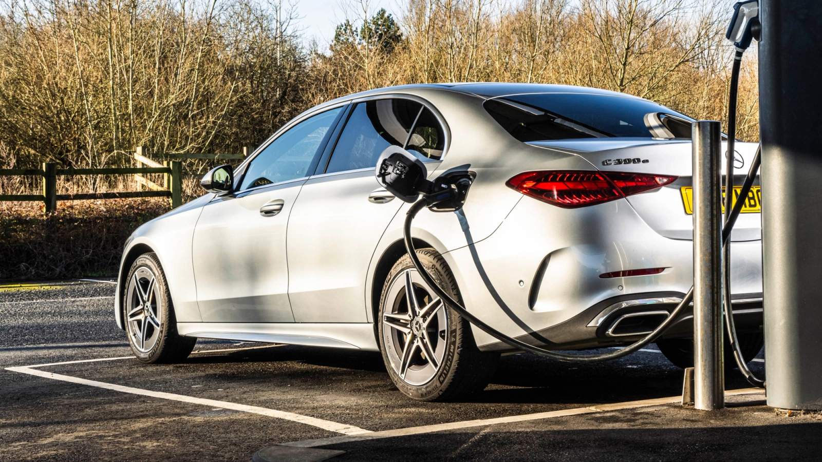 Silver Mercedes C-Class plug-in hybrid charging