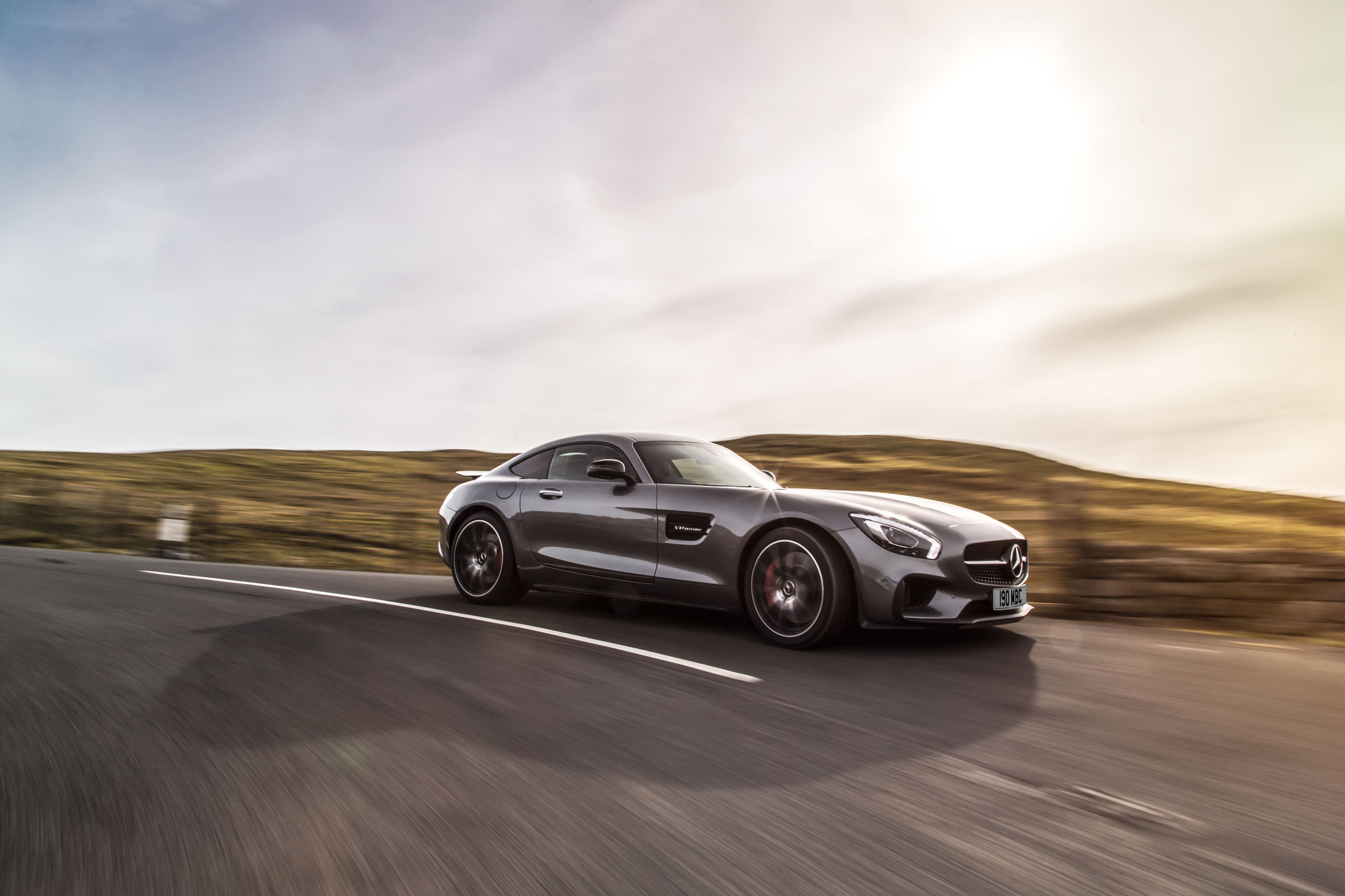 Grey Mercedes-AMG GT driving
