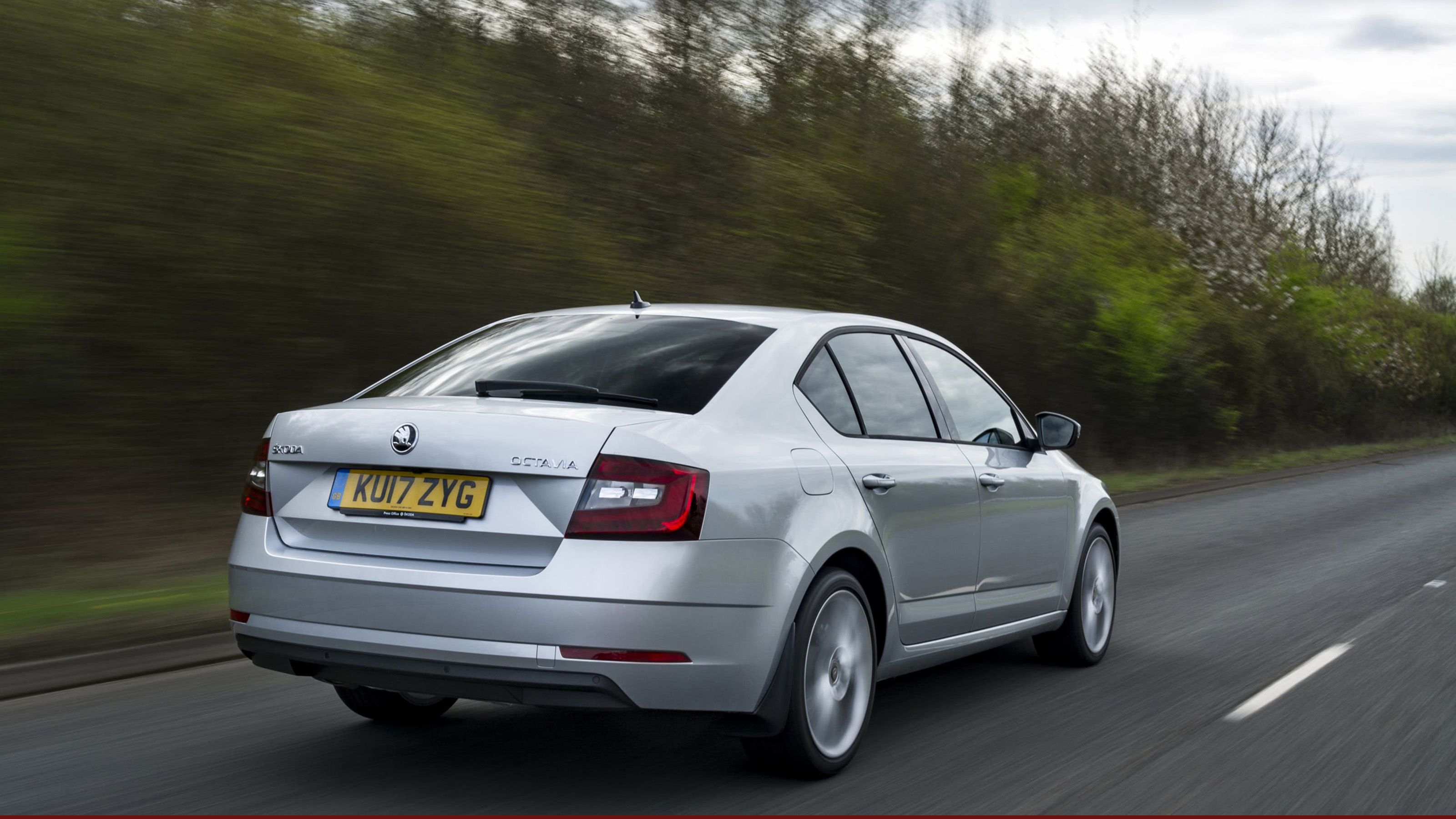 Silver Skoda Octavia rear driving