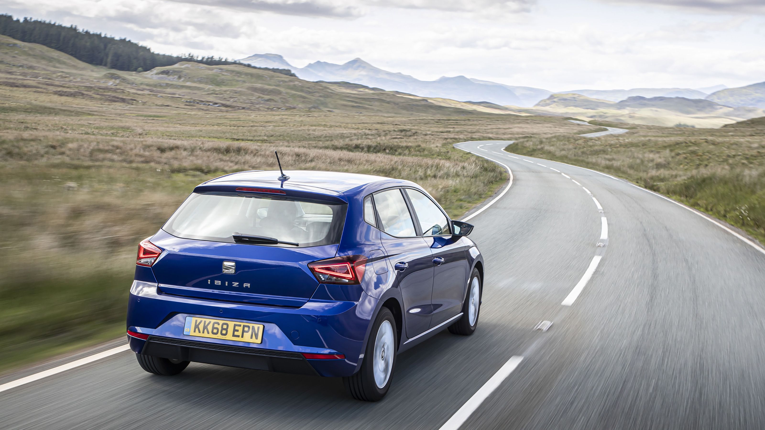 Blue Seat Ibiza rear driving