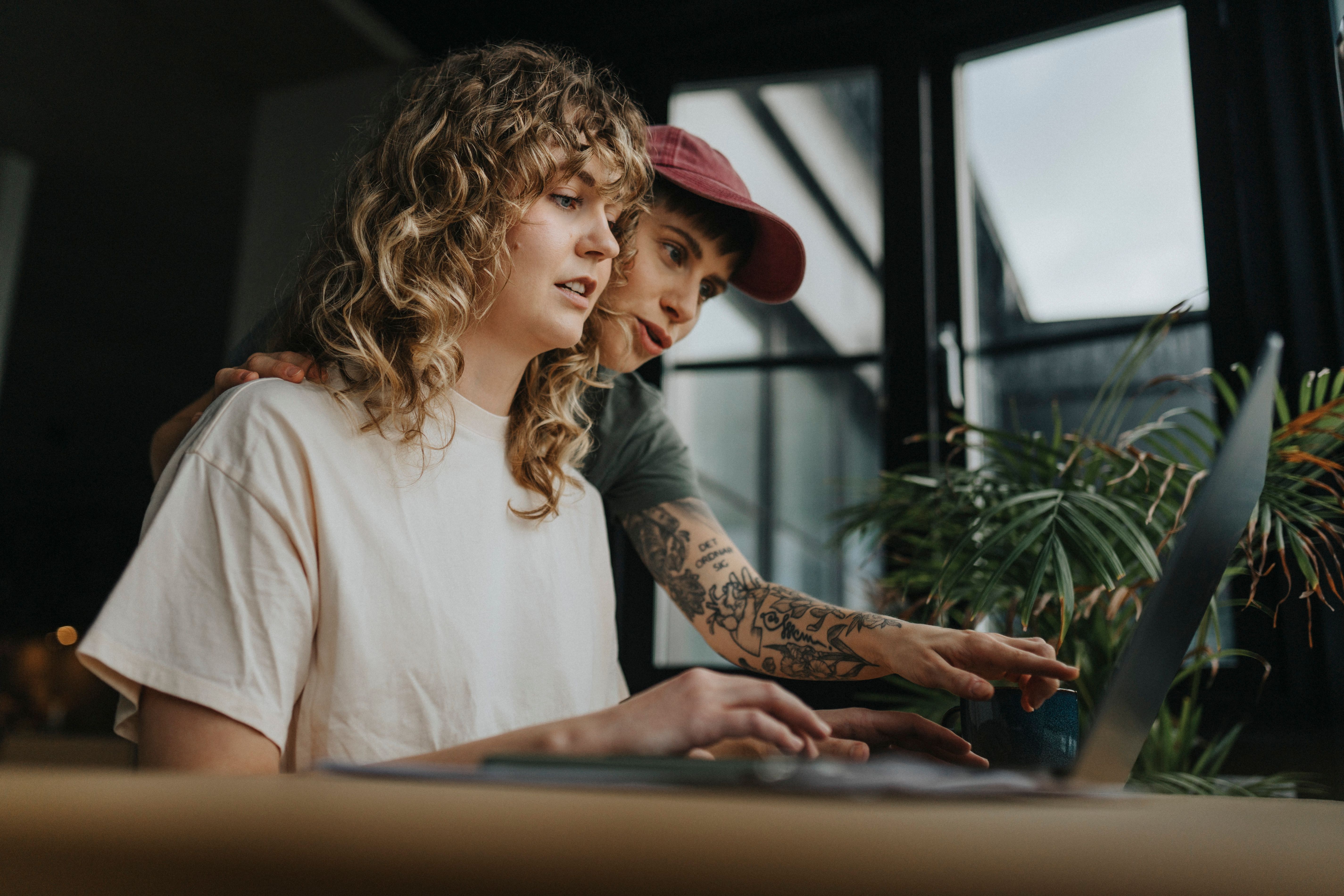 Cazoo - couple looking at laptop