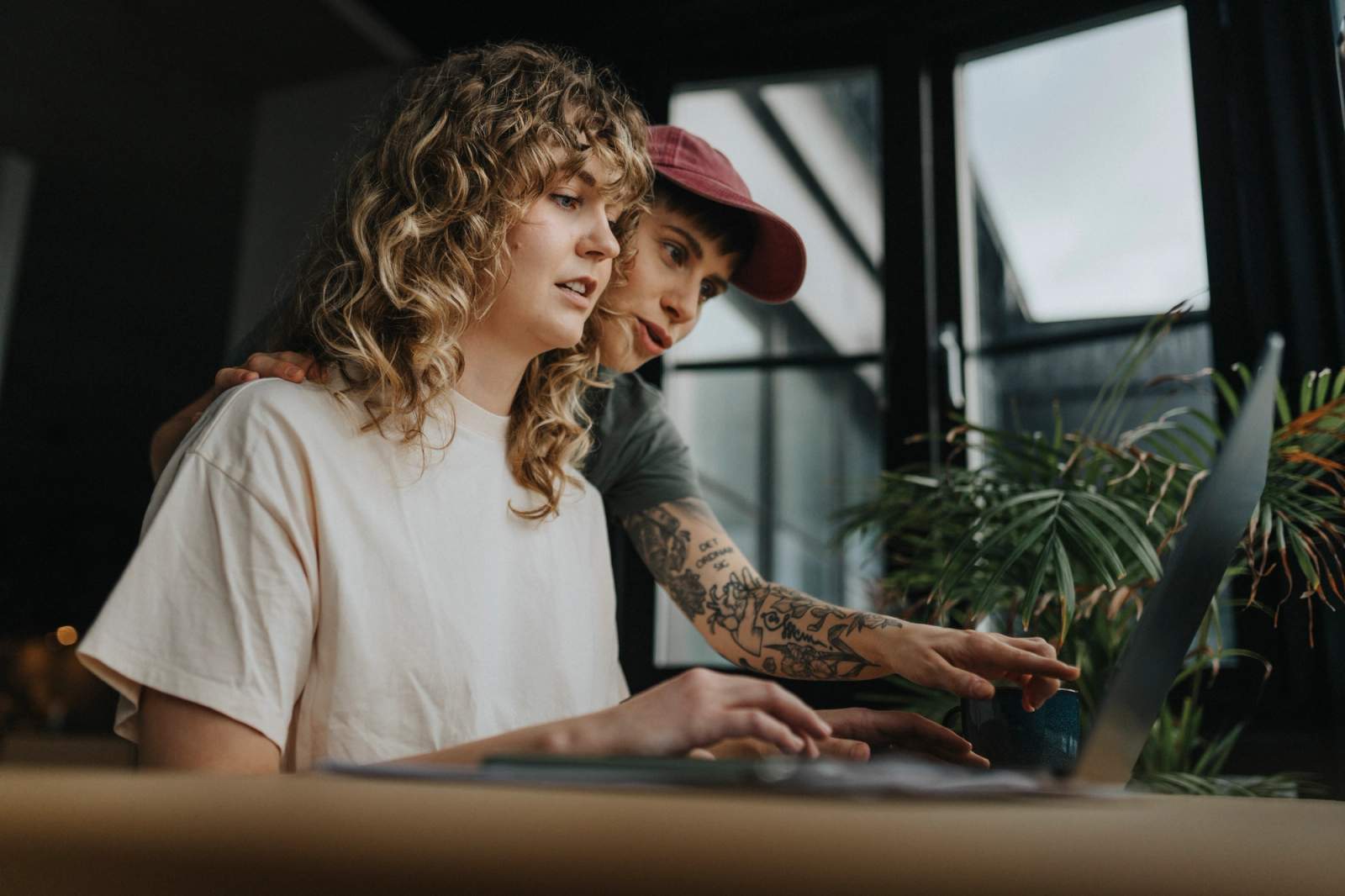 Cazoo - couple looking at laptop