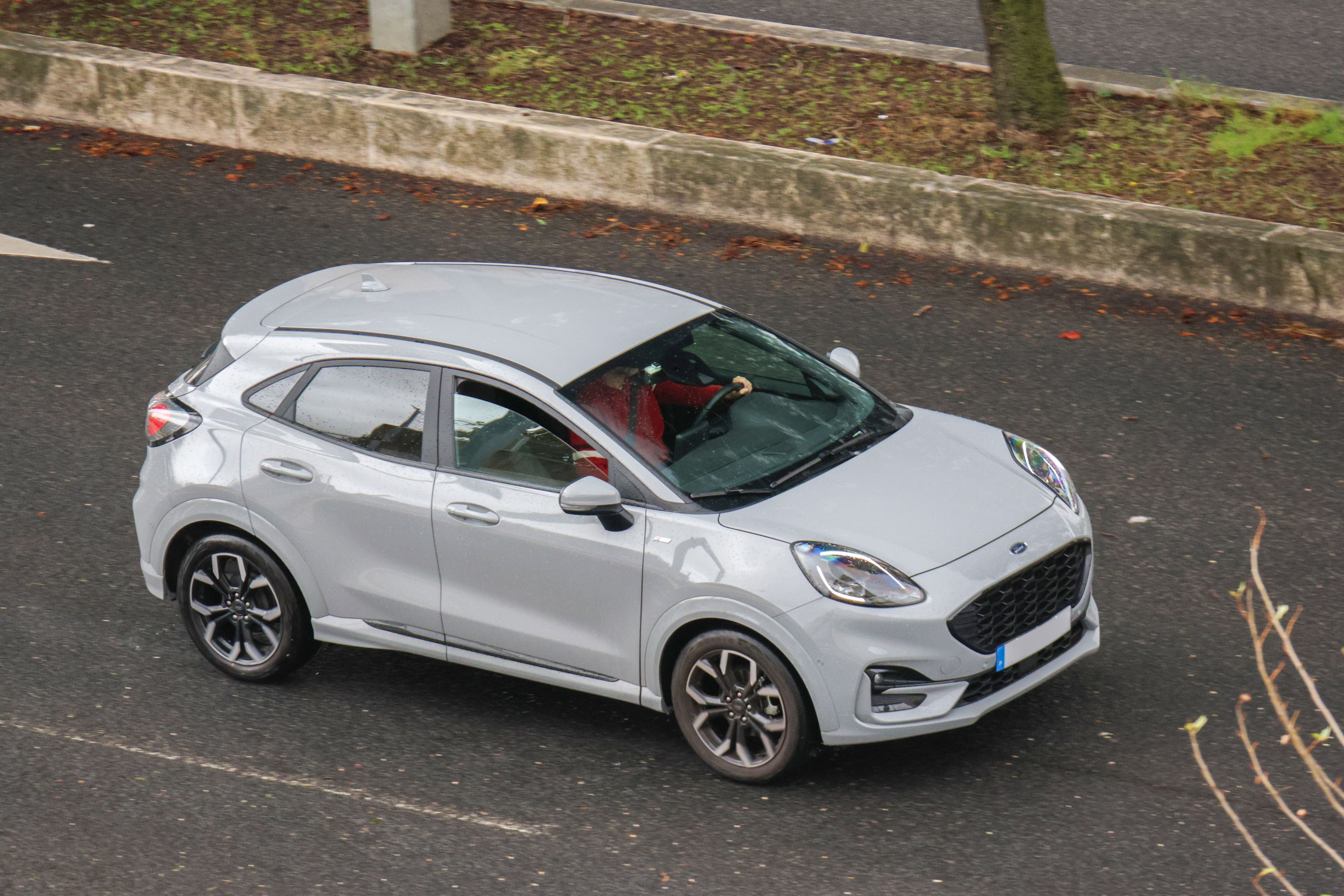 Grey car on the road