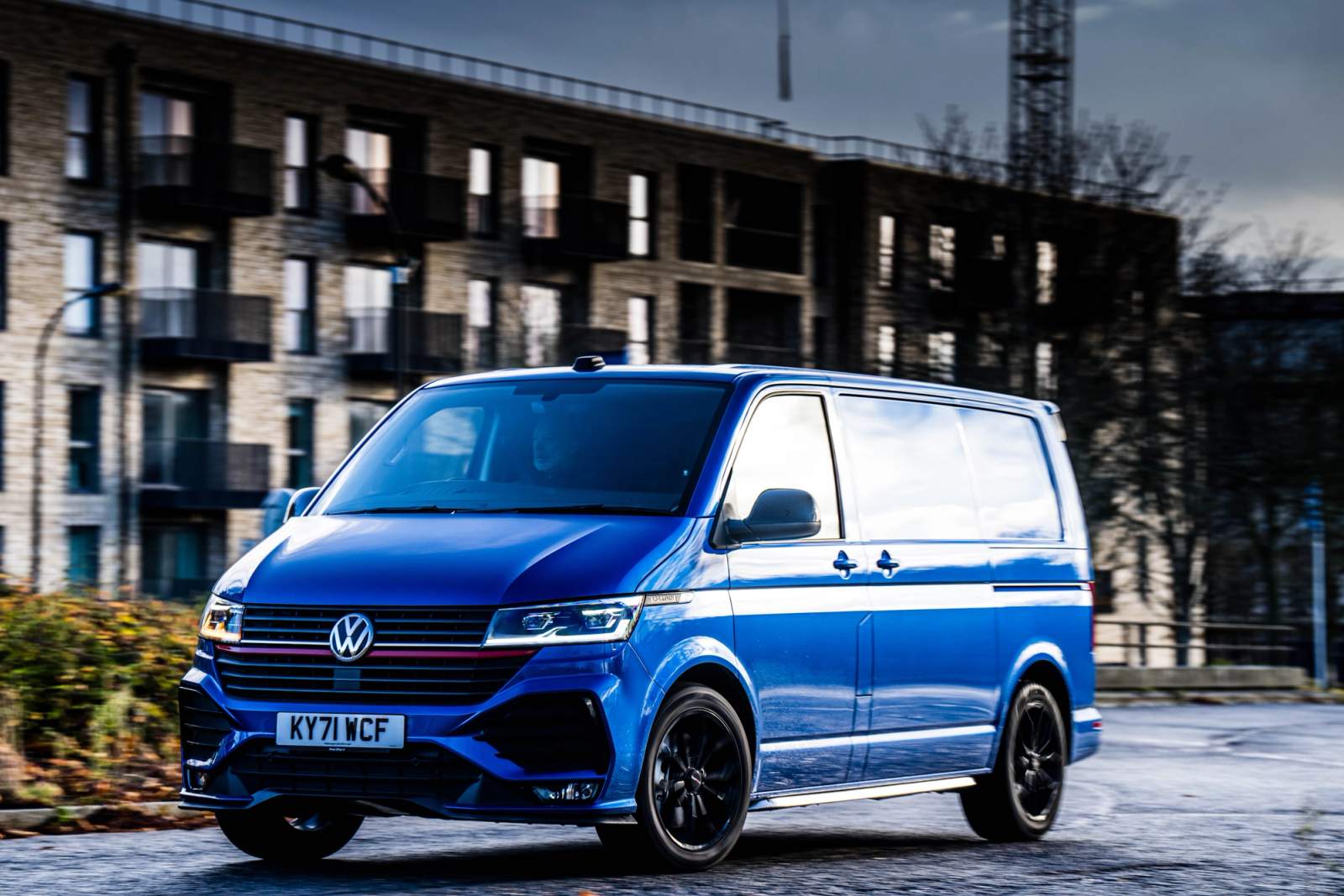 Blue Volkswagen Transporter driving 