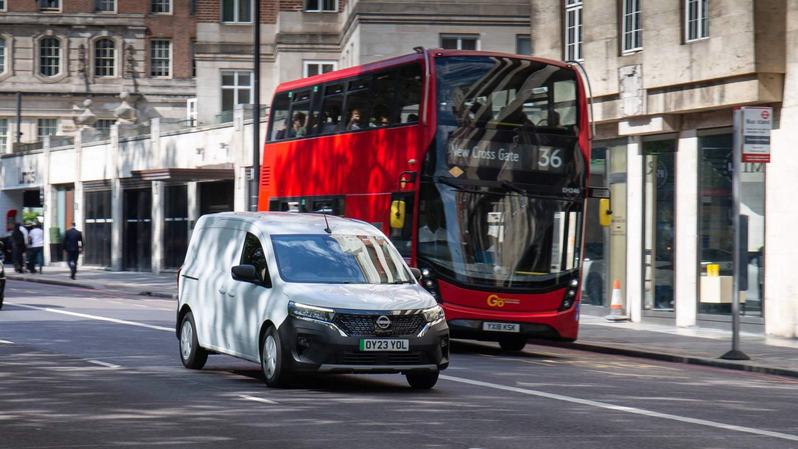 London bus and electric van driving in the ULEZ