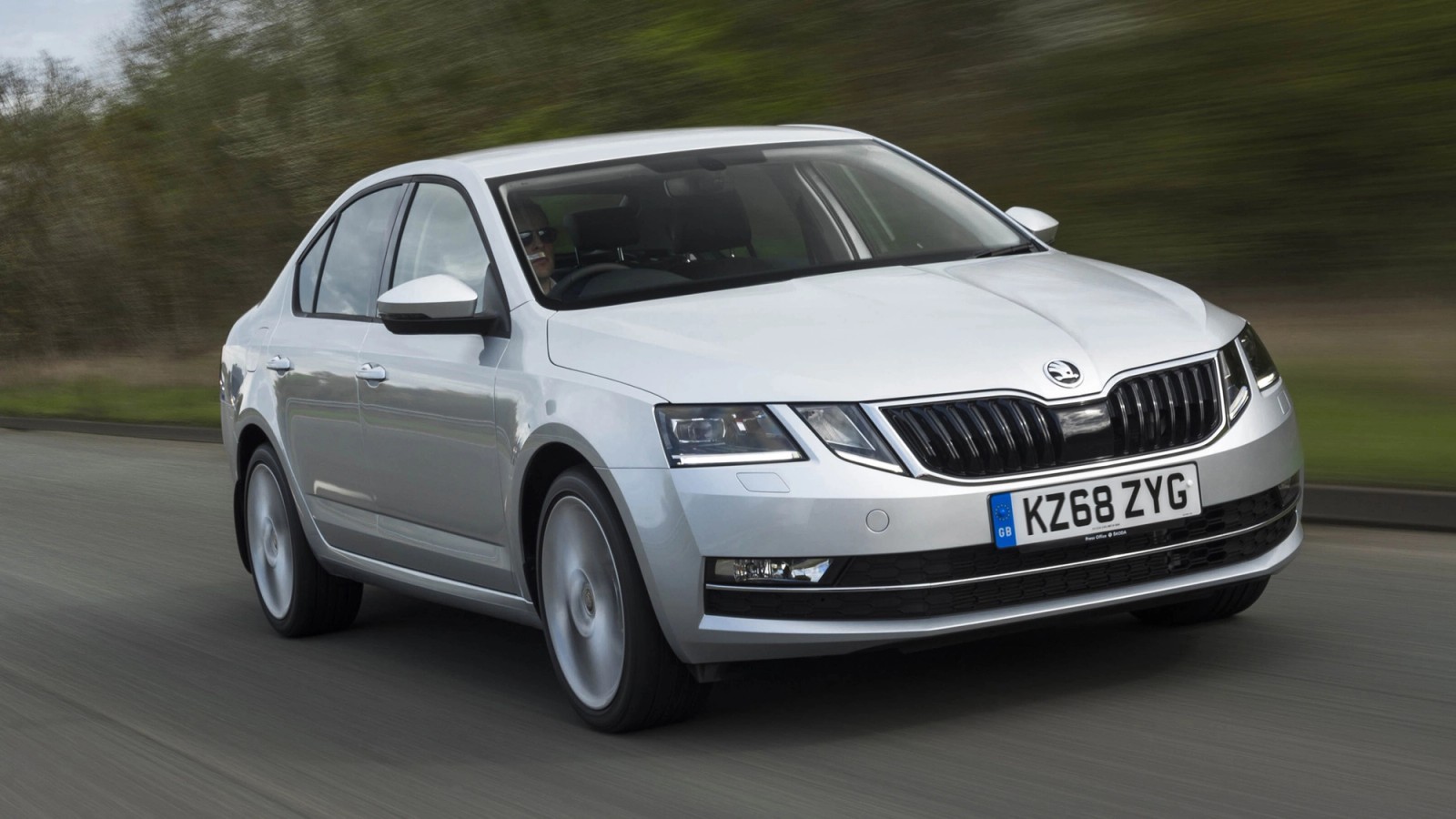 Silver Skoda Octavia front driving