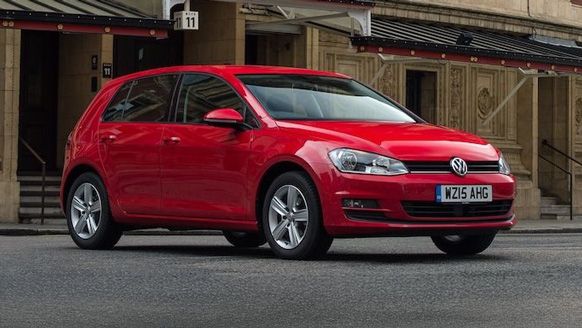 VW Gold front quarter parked