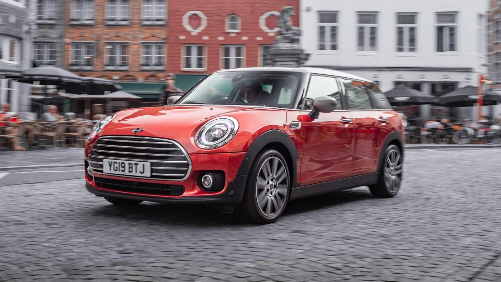 Red Mini Clubman front driving