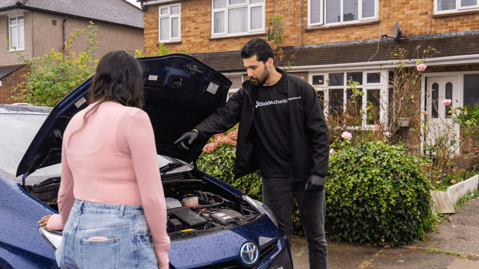 mechanic with car