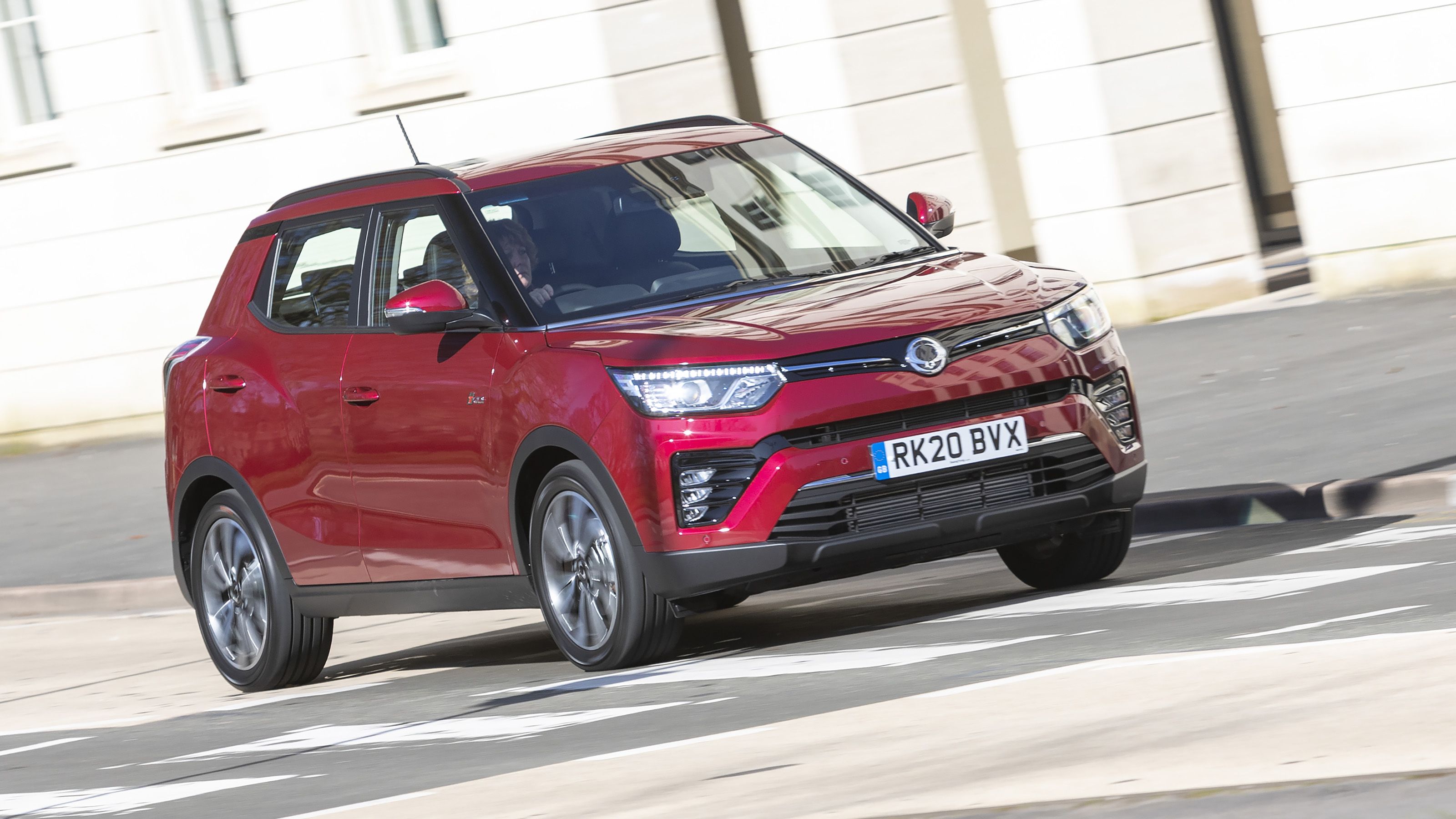 Red SsangYong Tivoli front driving