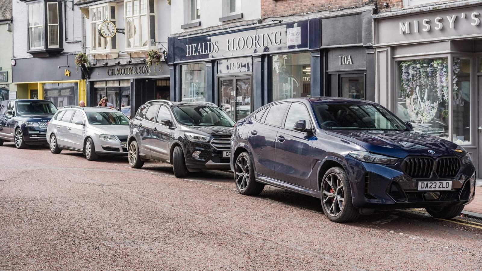 SUVs parked on the street