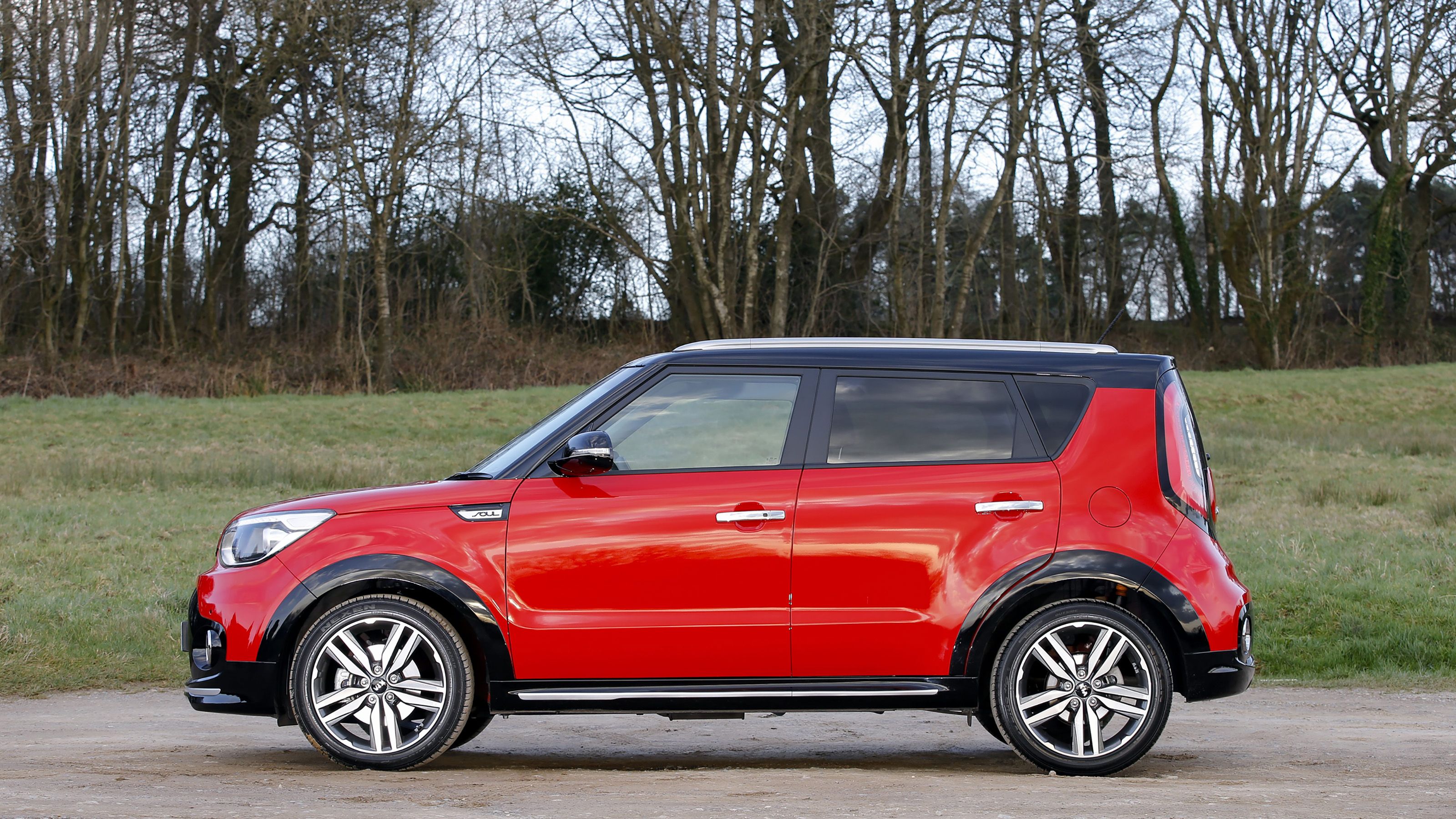 Red Kia Soul side
