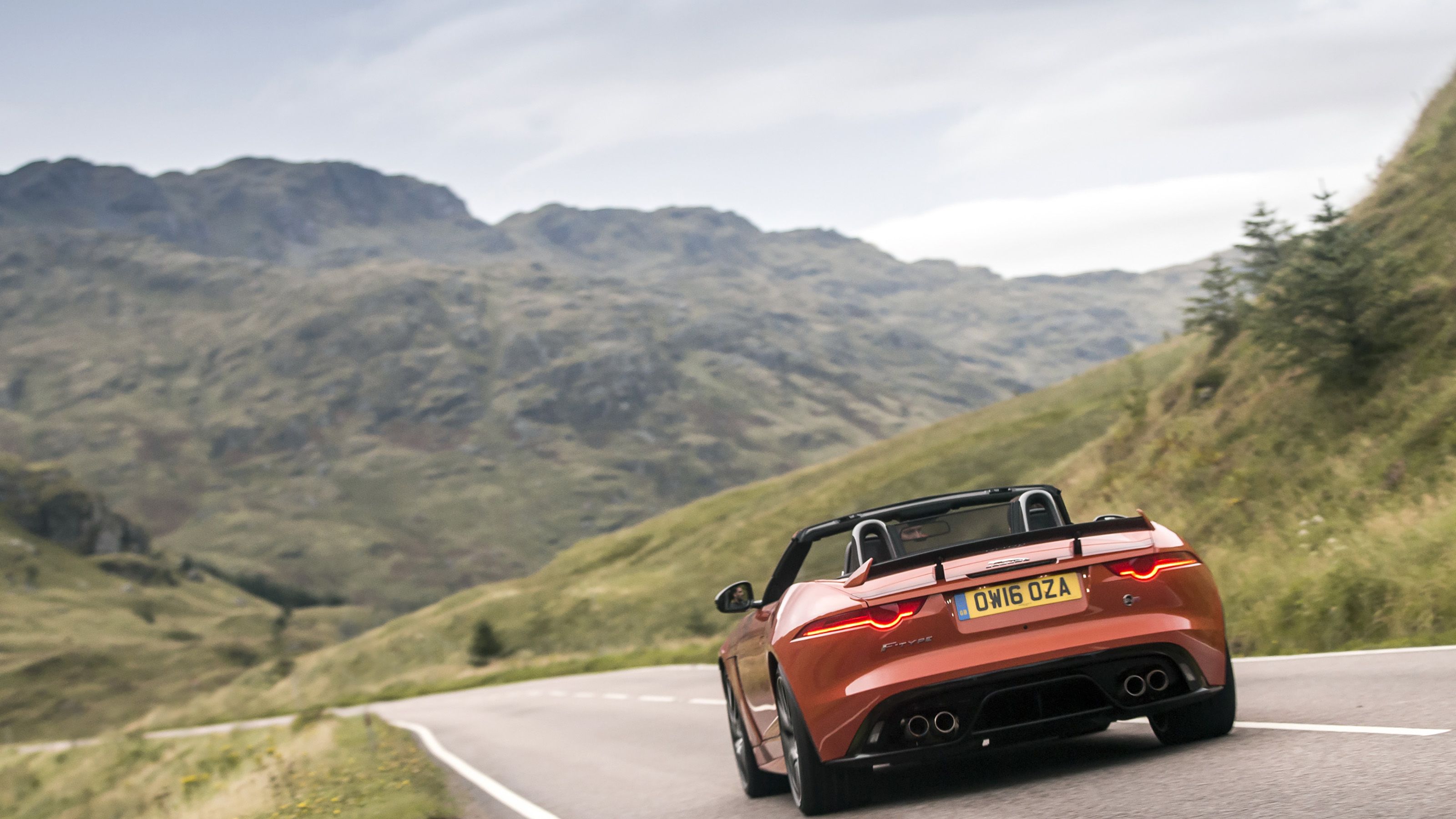 Orange Jaguar F-Type SVR rear driving