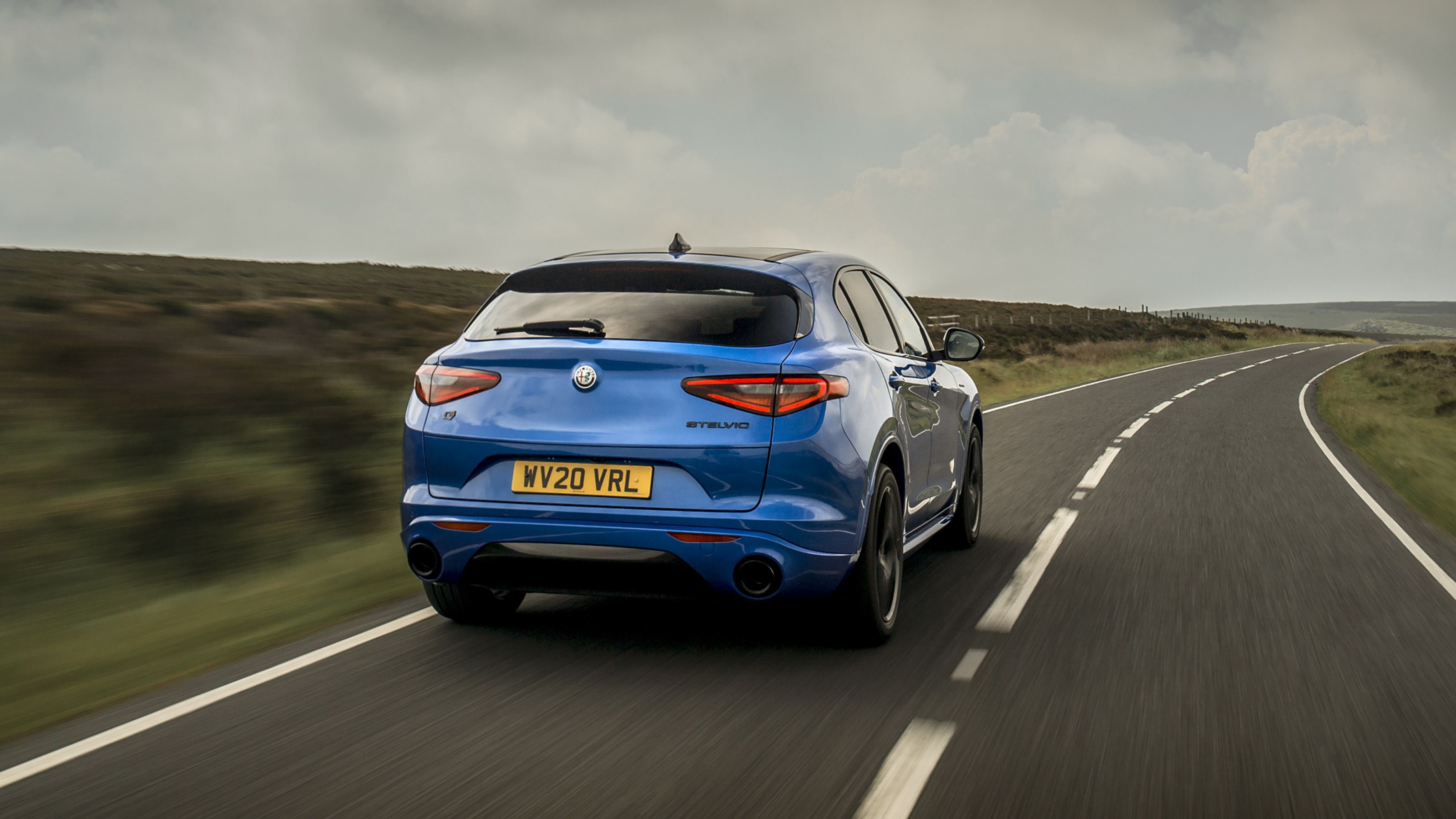 Blue Alfa Romeo Stelvio rear driving
