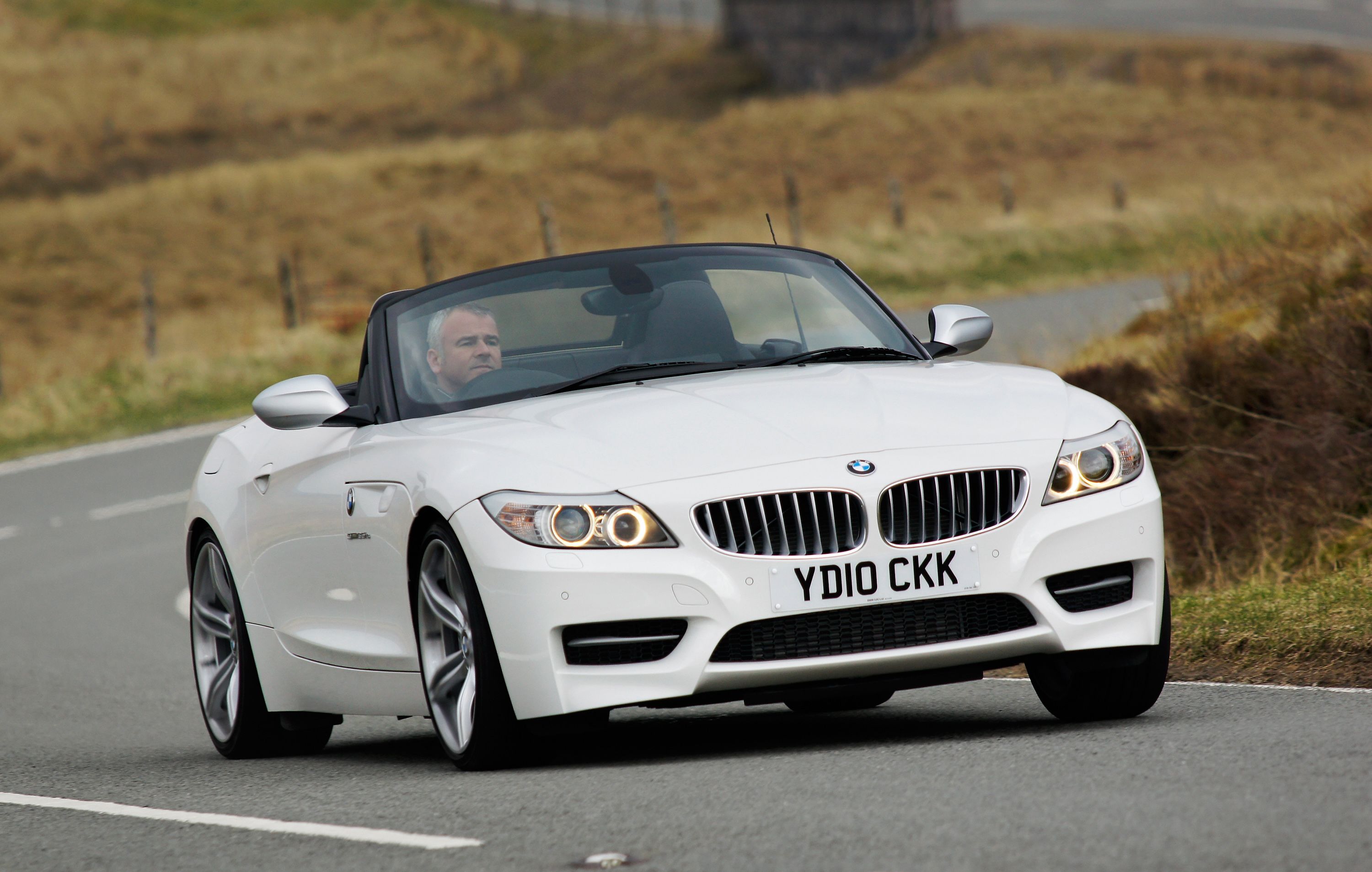 White BMW Z4 driving