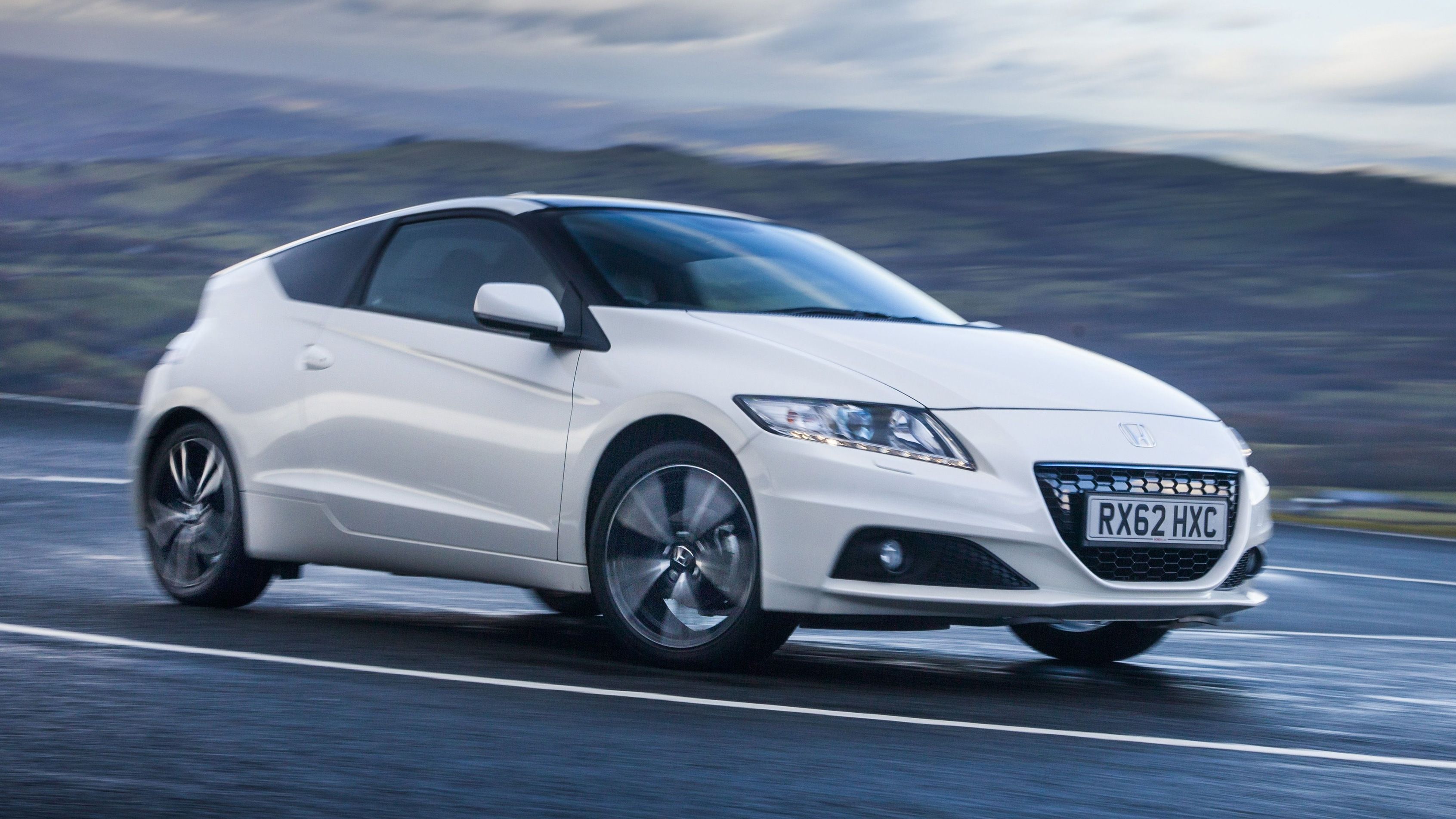 White Honda CR-Z driving round a corner