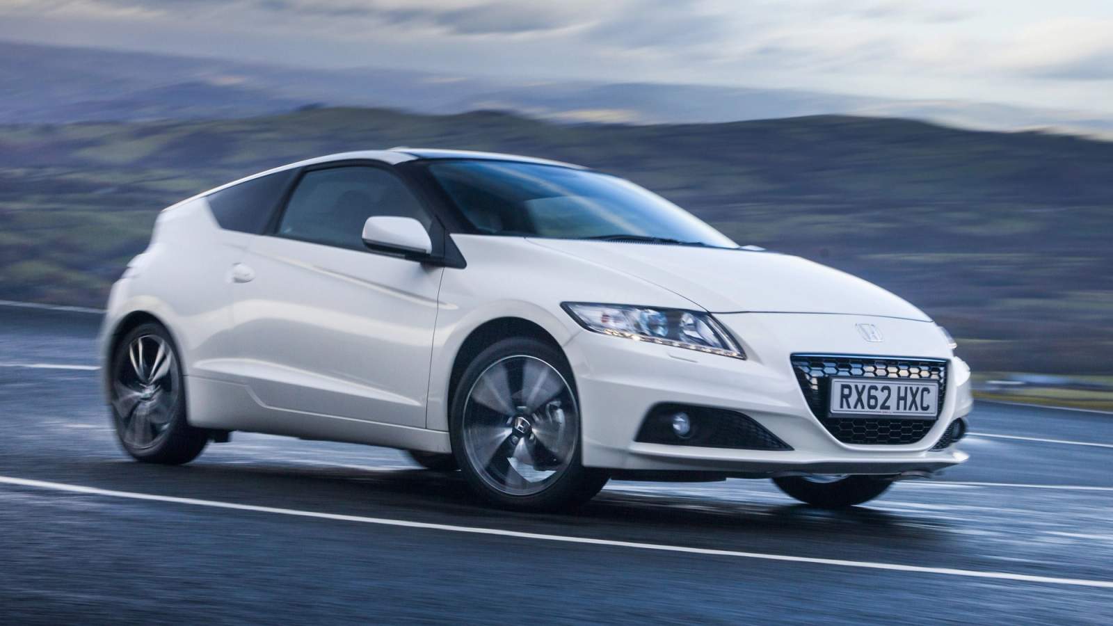 White Honda CR-Z driving round a corner