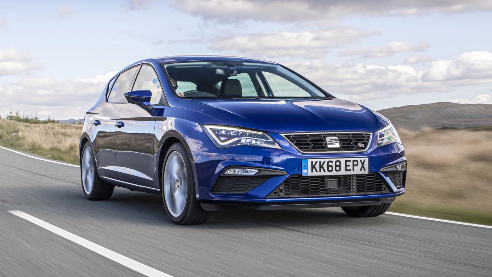 Blue Seat Leon front driving