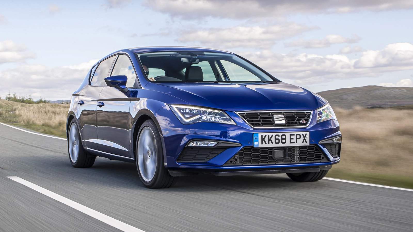 Blue Seat Leon front driving