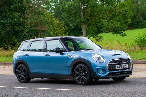 Mini blue car on the road