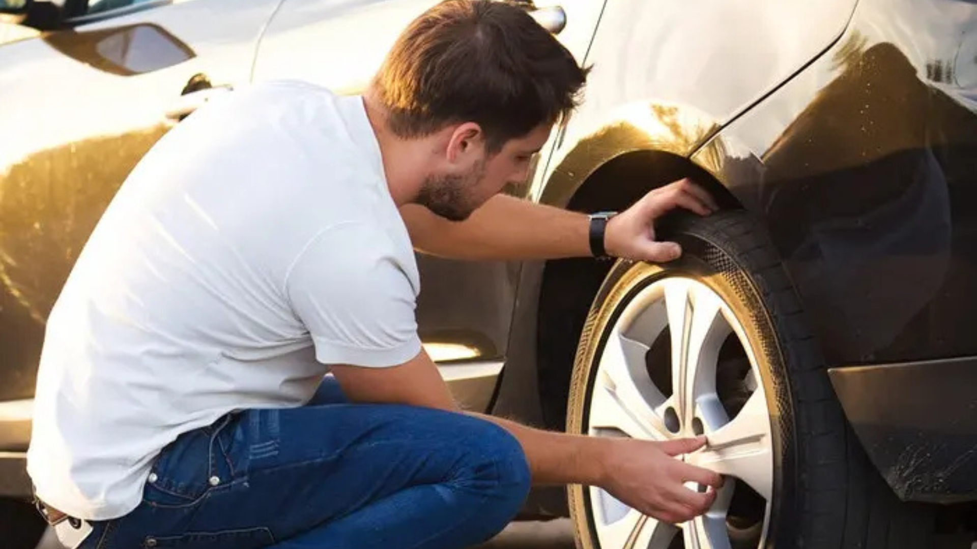 man changing tyre