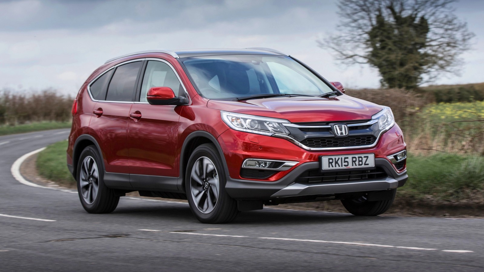 Red Honda CR-V front driving