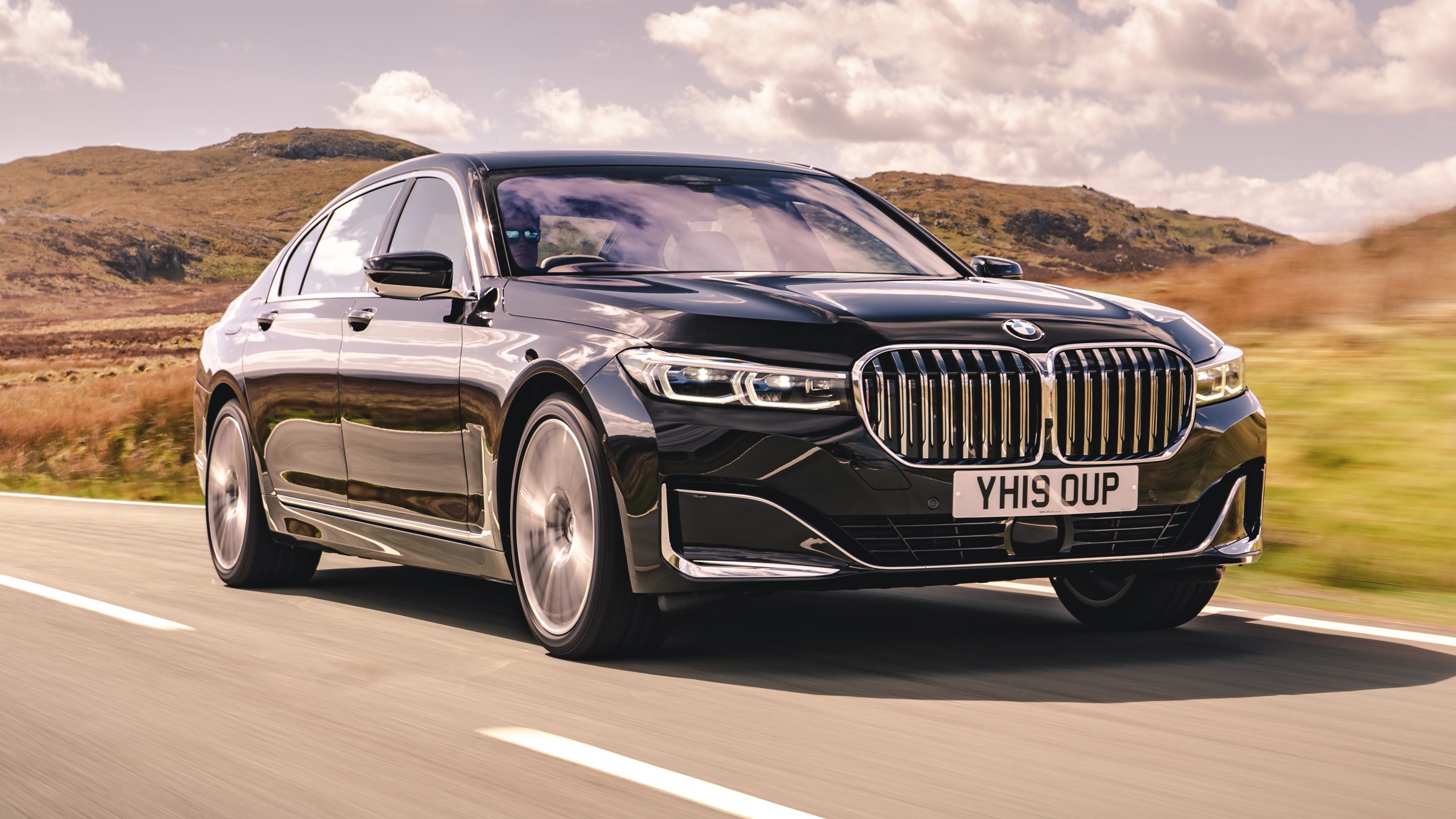 Black BMW 7 Series front driving