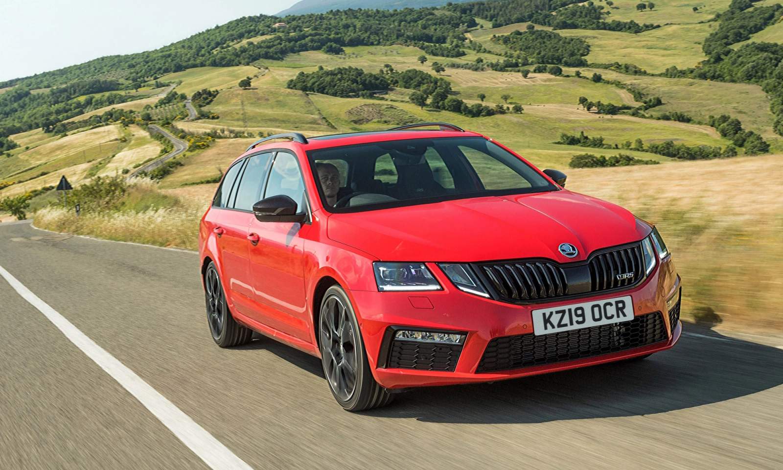 Red Skoda Octavia vRS driving
