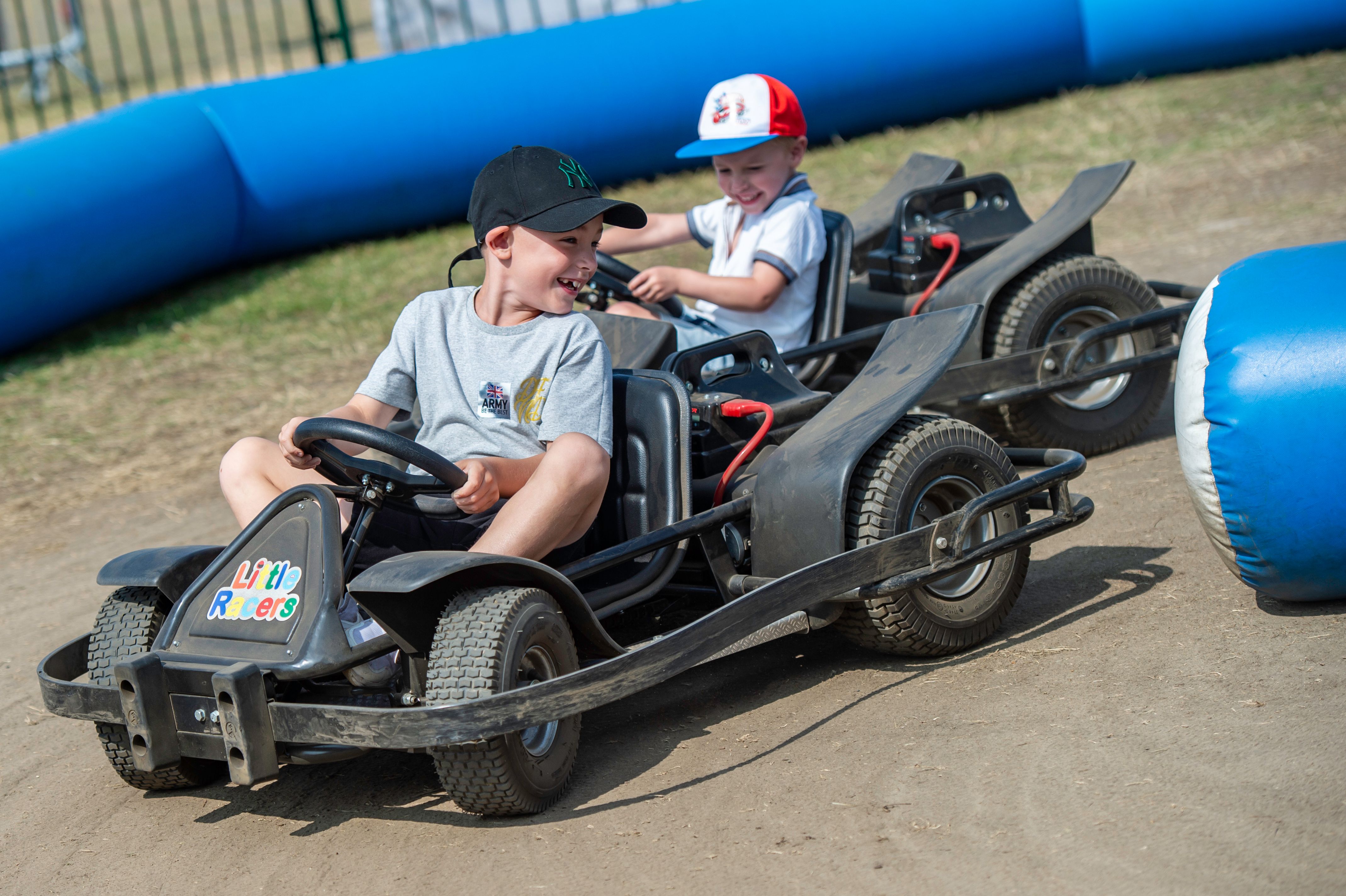 kids driving kart cars