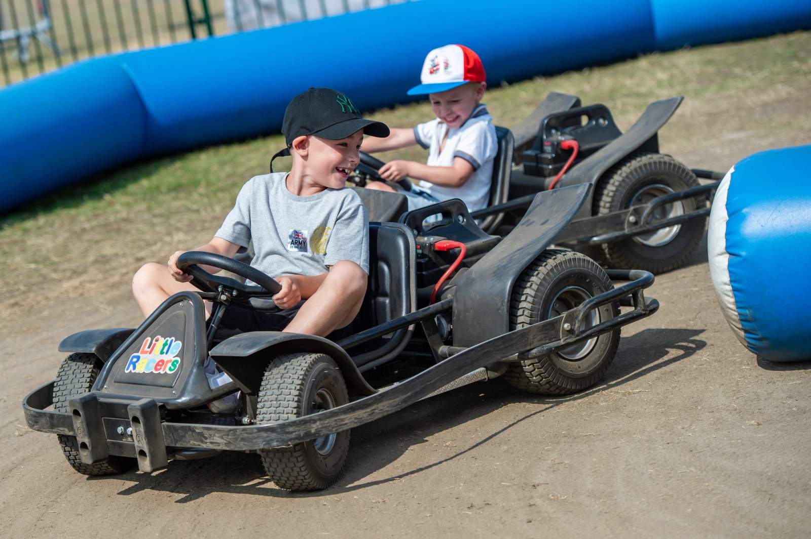 kids driving kart cars