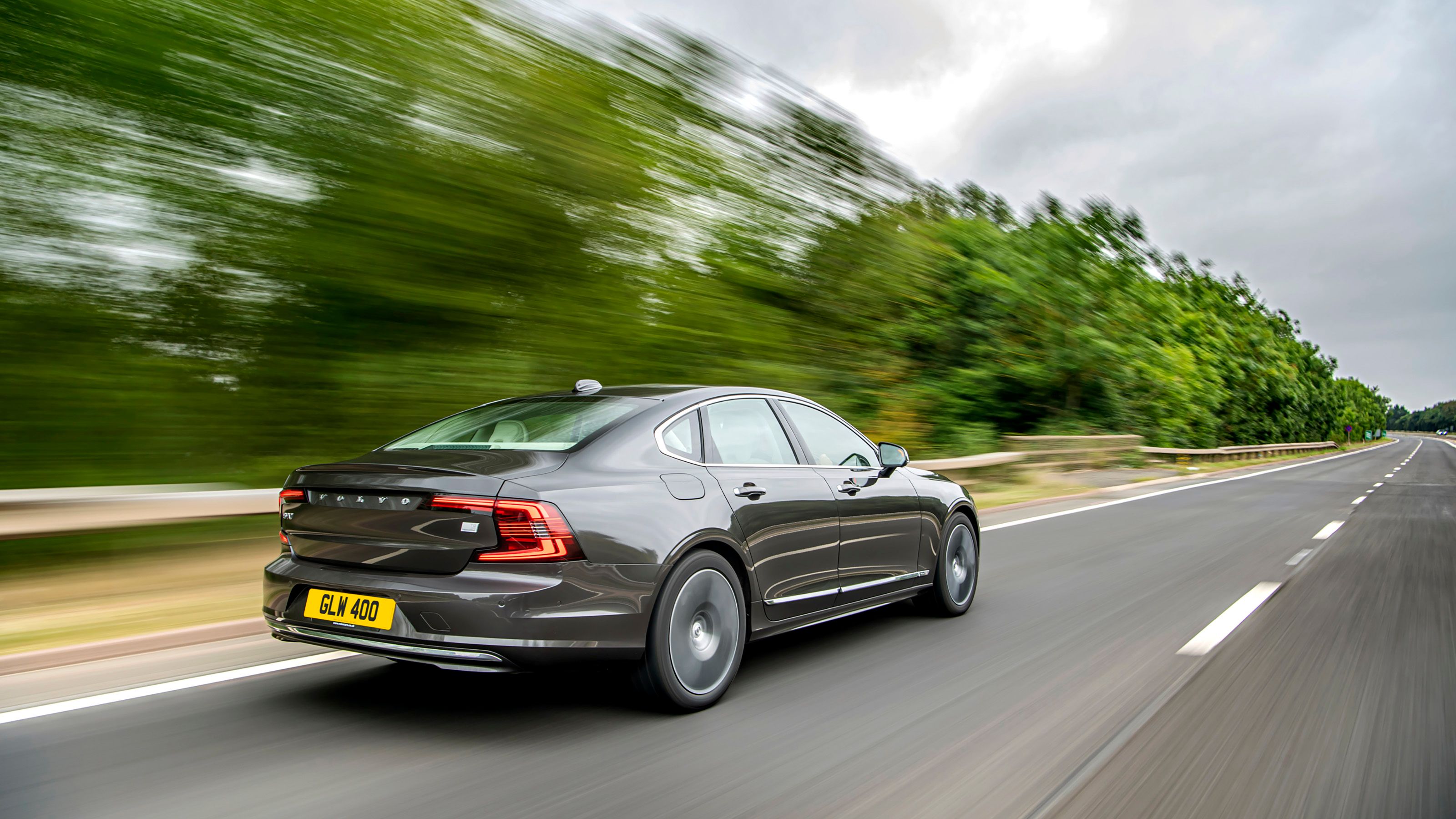 Brown Volvo S90 rear driving
