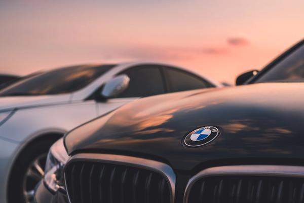 front of BMW cars