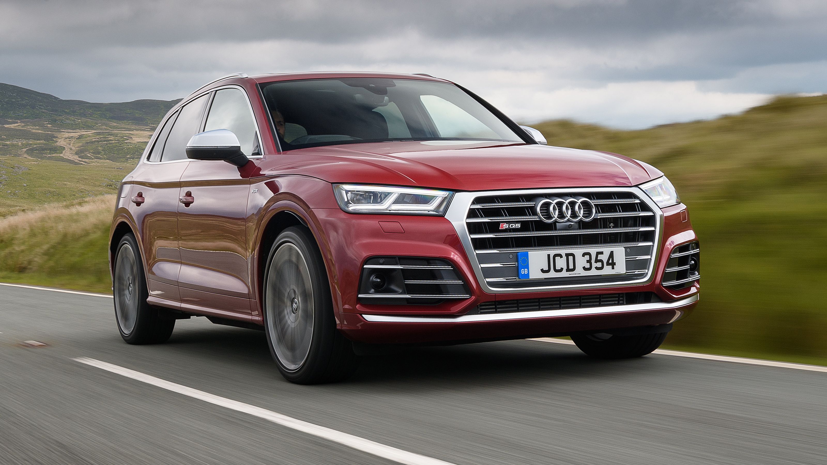 Red Audi SQ5 front driving