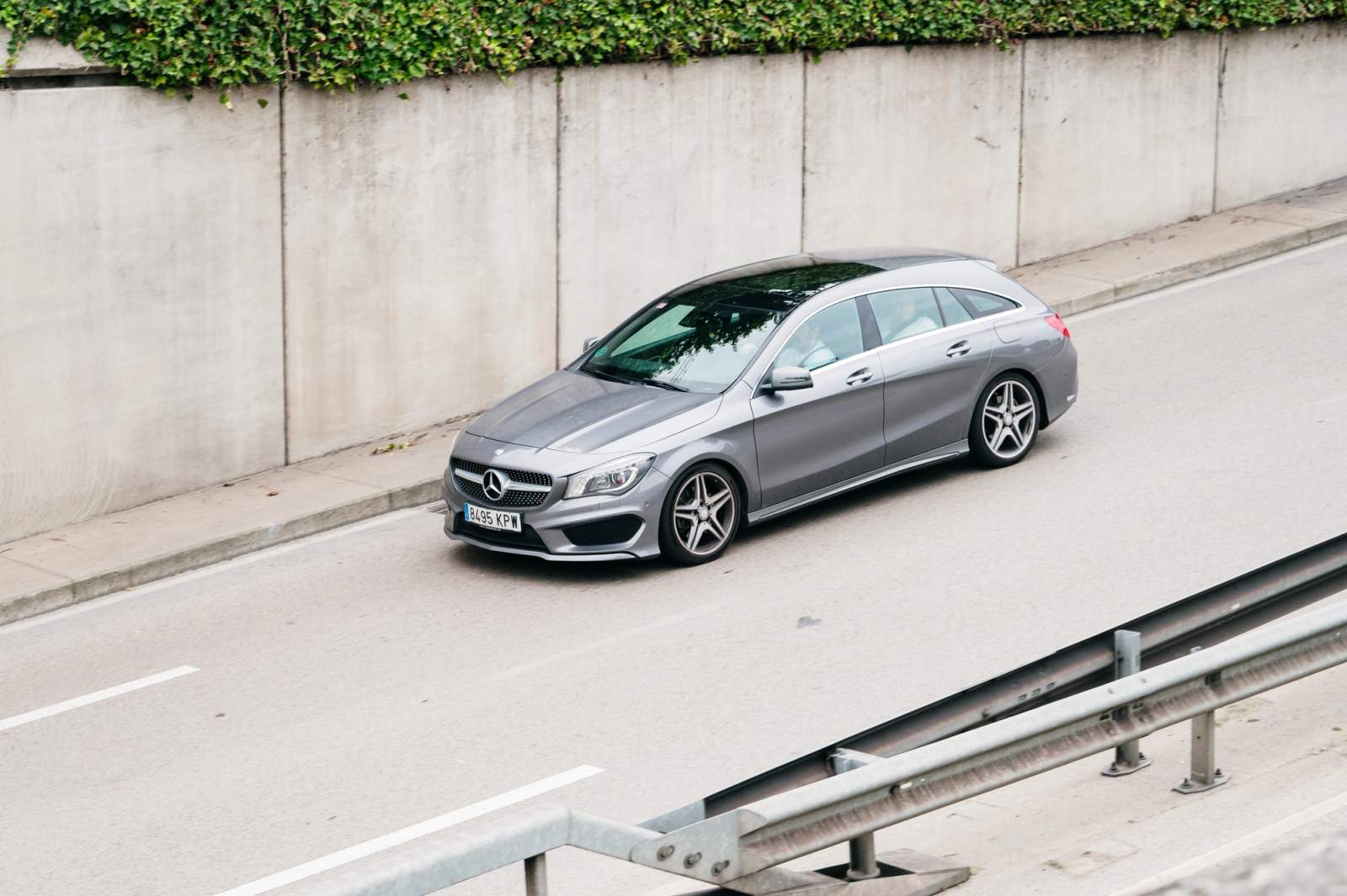 silver mercedes on the road