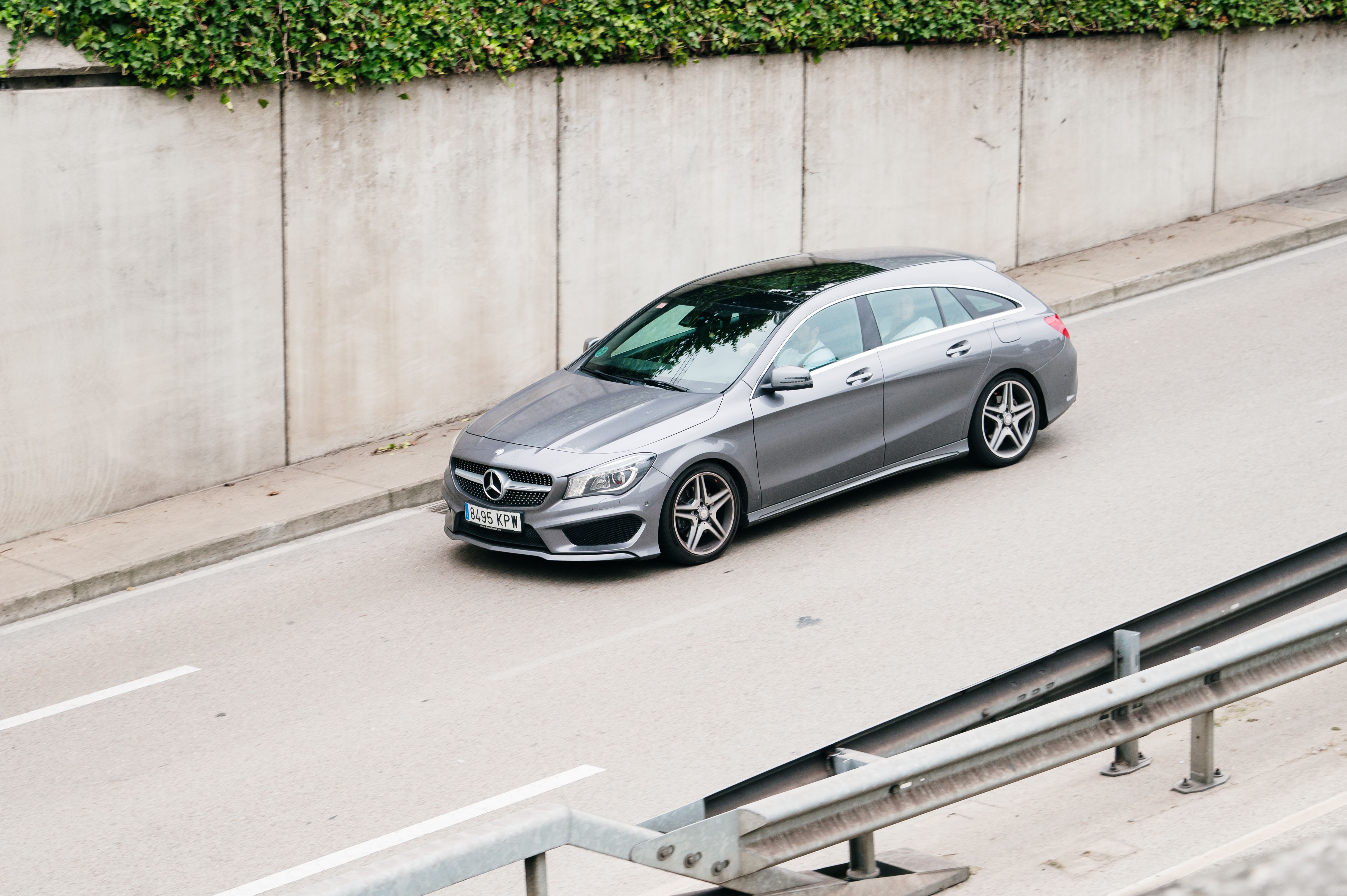 silver mercedes on the road