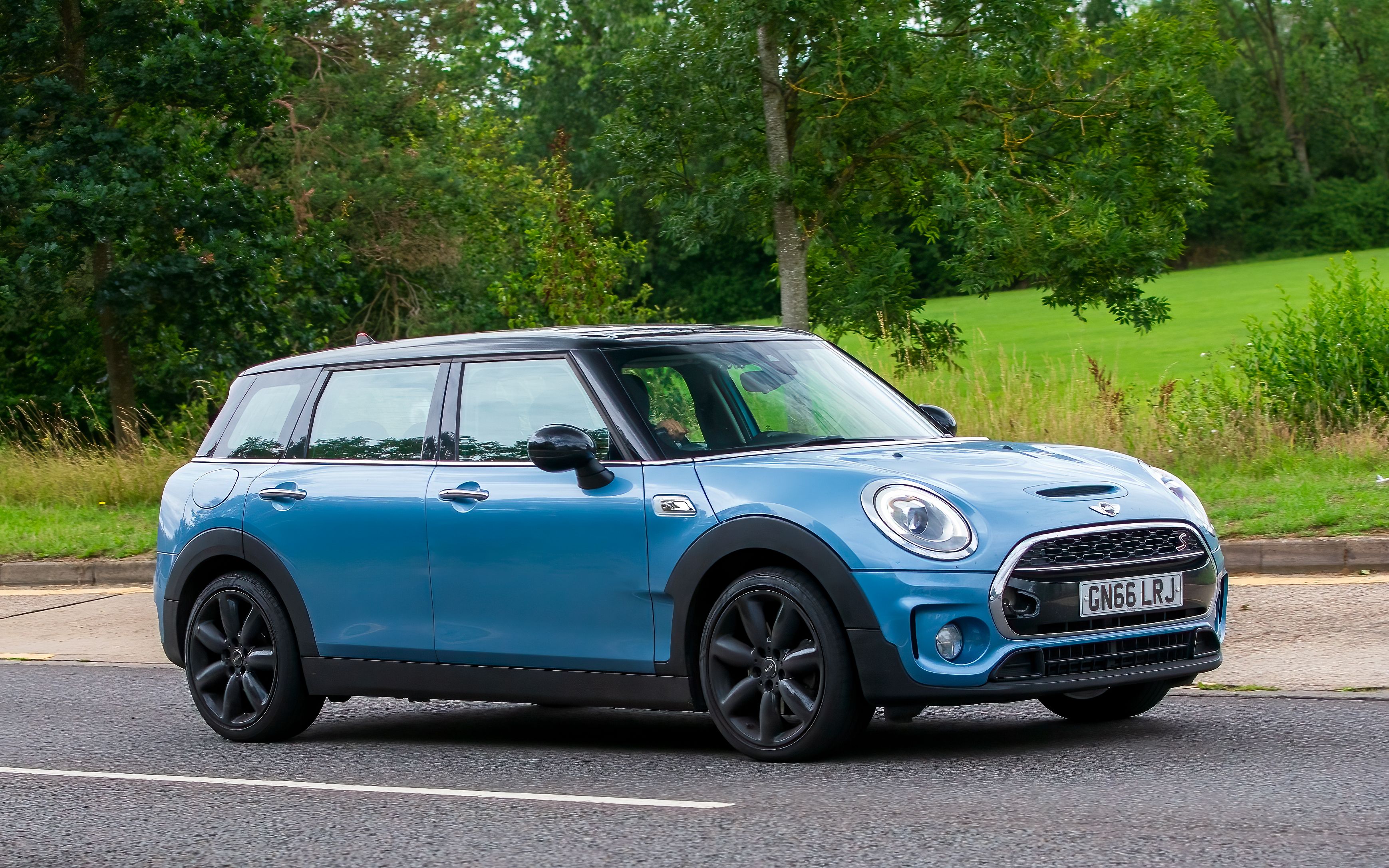 blue MINI on the road