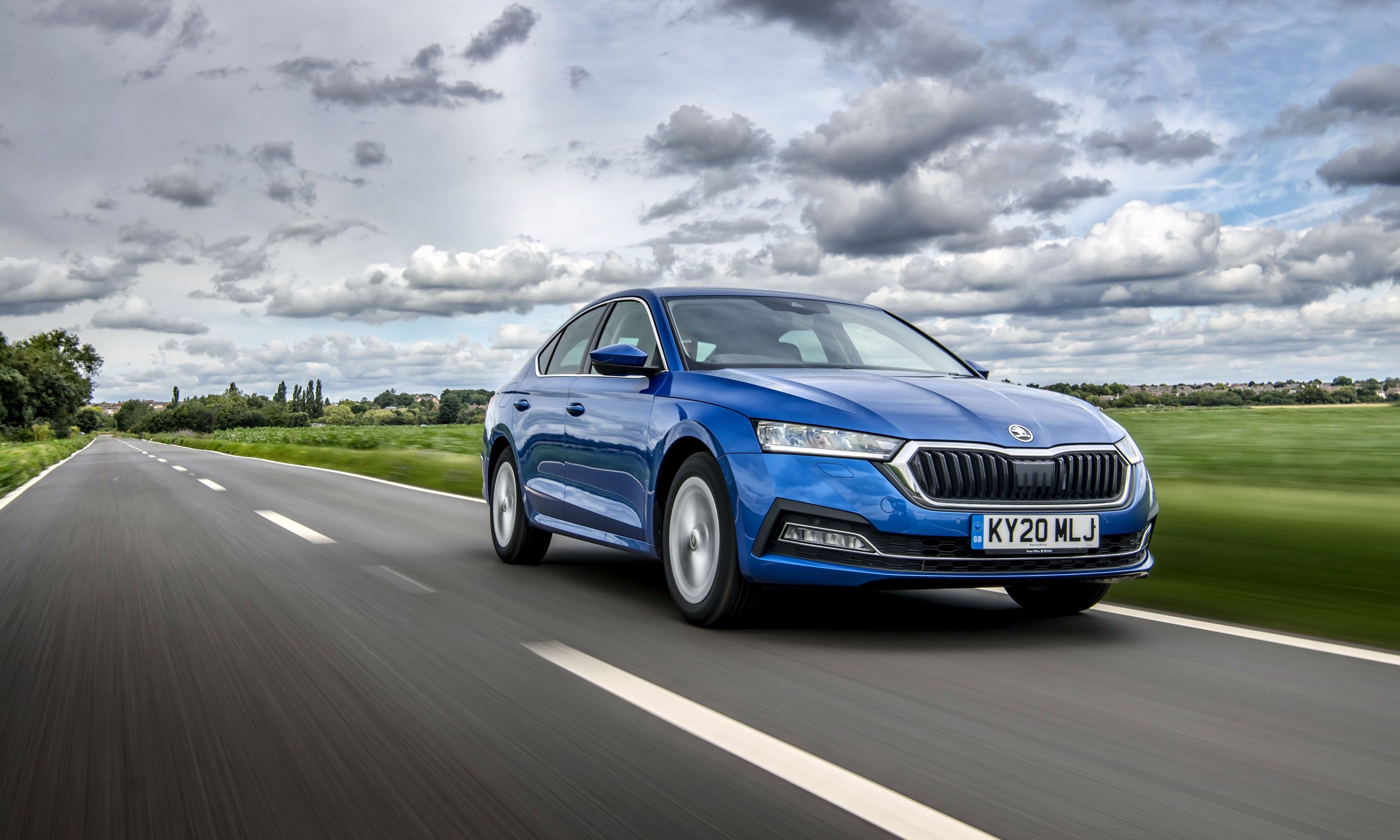 Blue Skoda Octavia driving