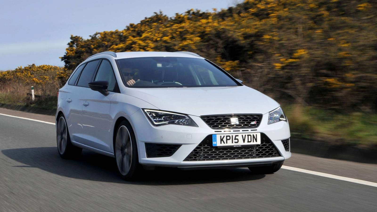 White SEAT Leon driving