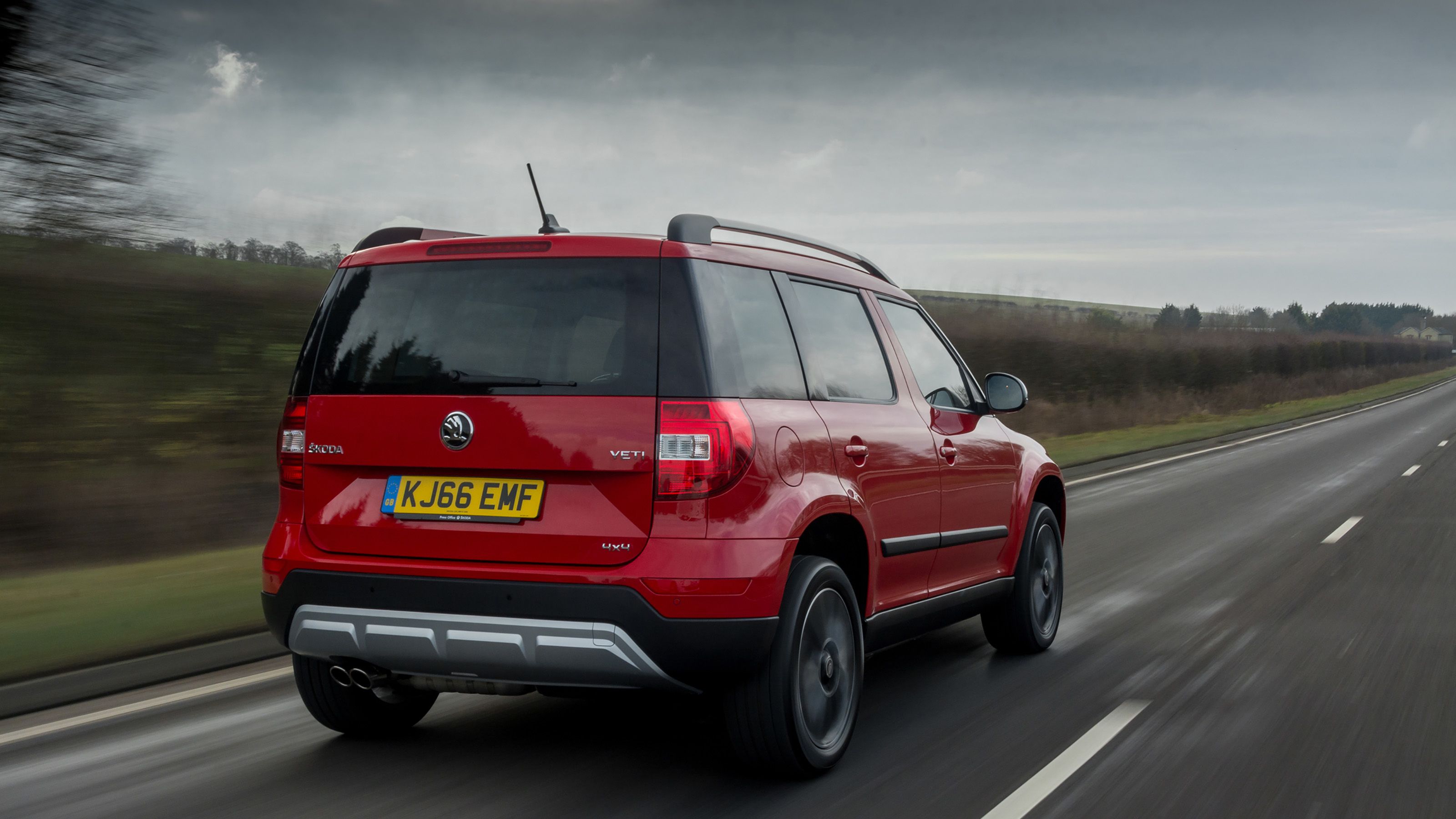 Red Skoda Yeti rear driving
