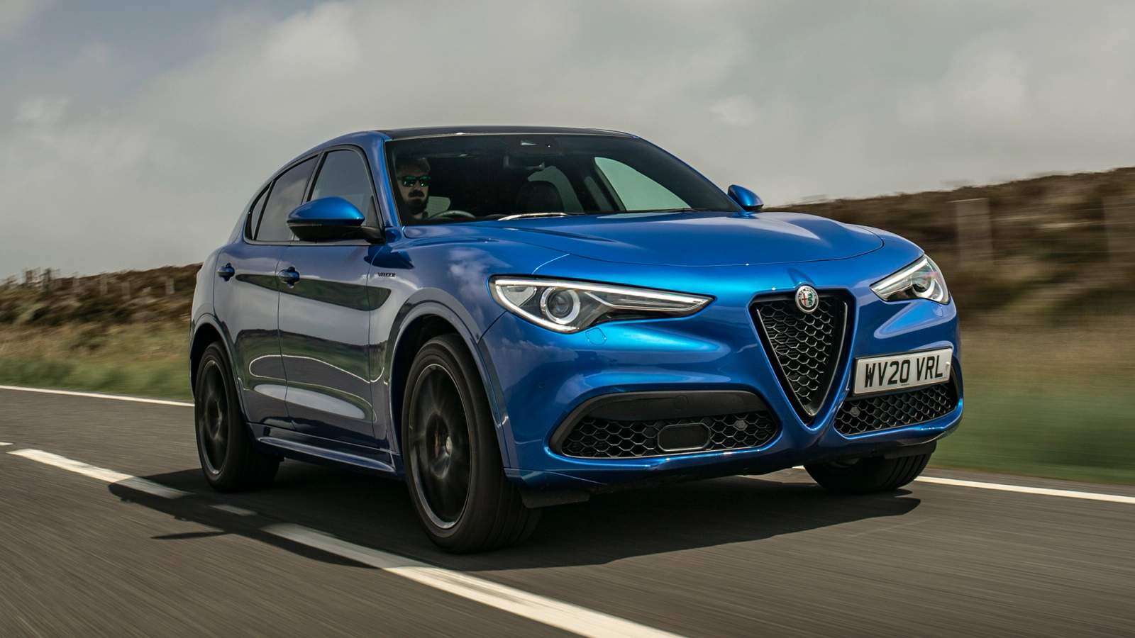 Blue Alfa Romeo Stelvio front driving