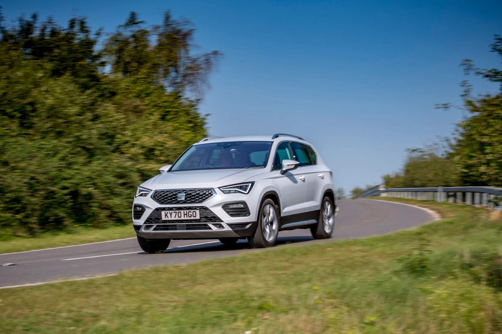 white ateca driving 