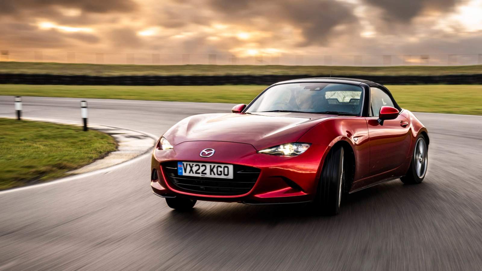 Mazda MX-5 sliding around a corner at a track day