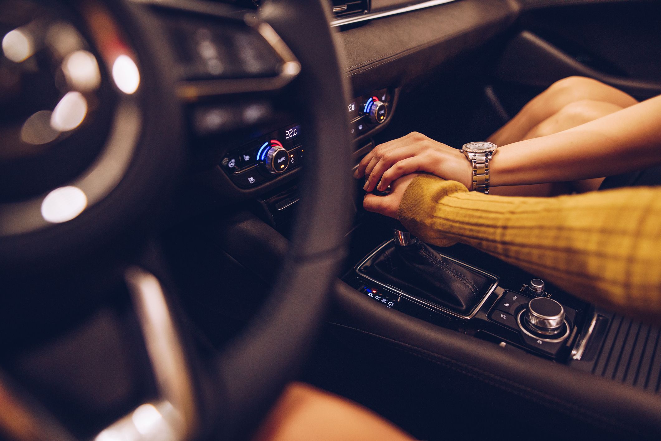 Holding hands in car