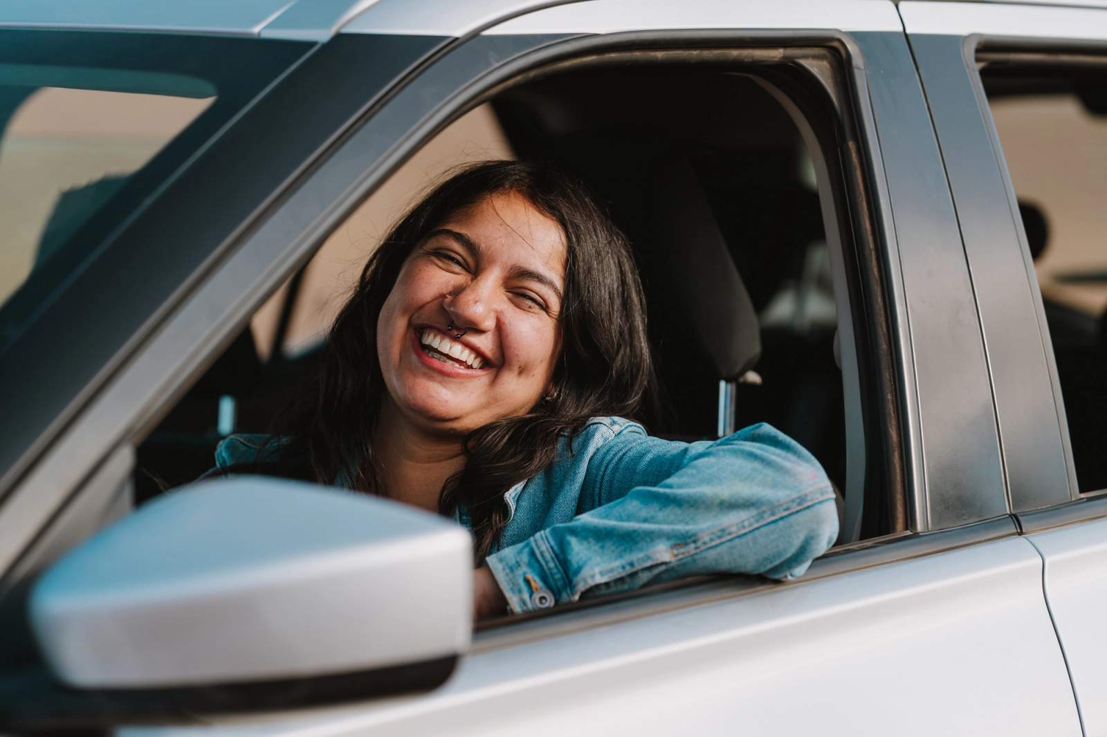 person in car