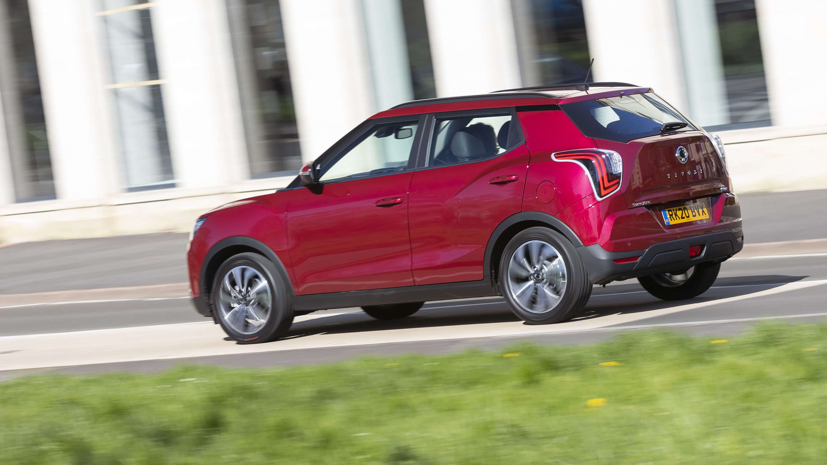 Red SsangYong Tivoli rear driving