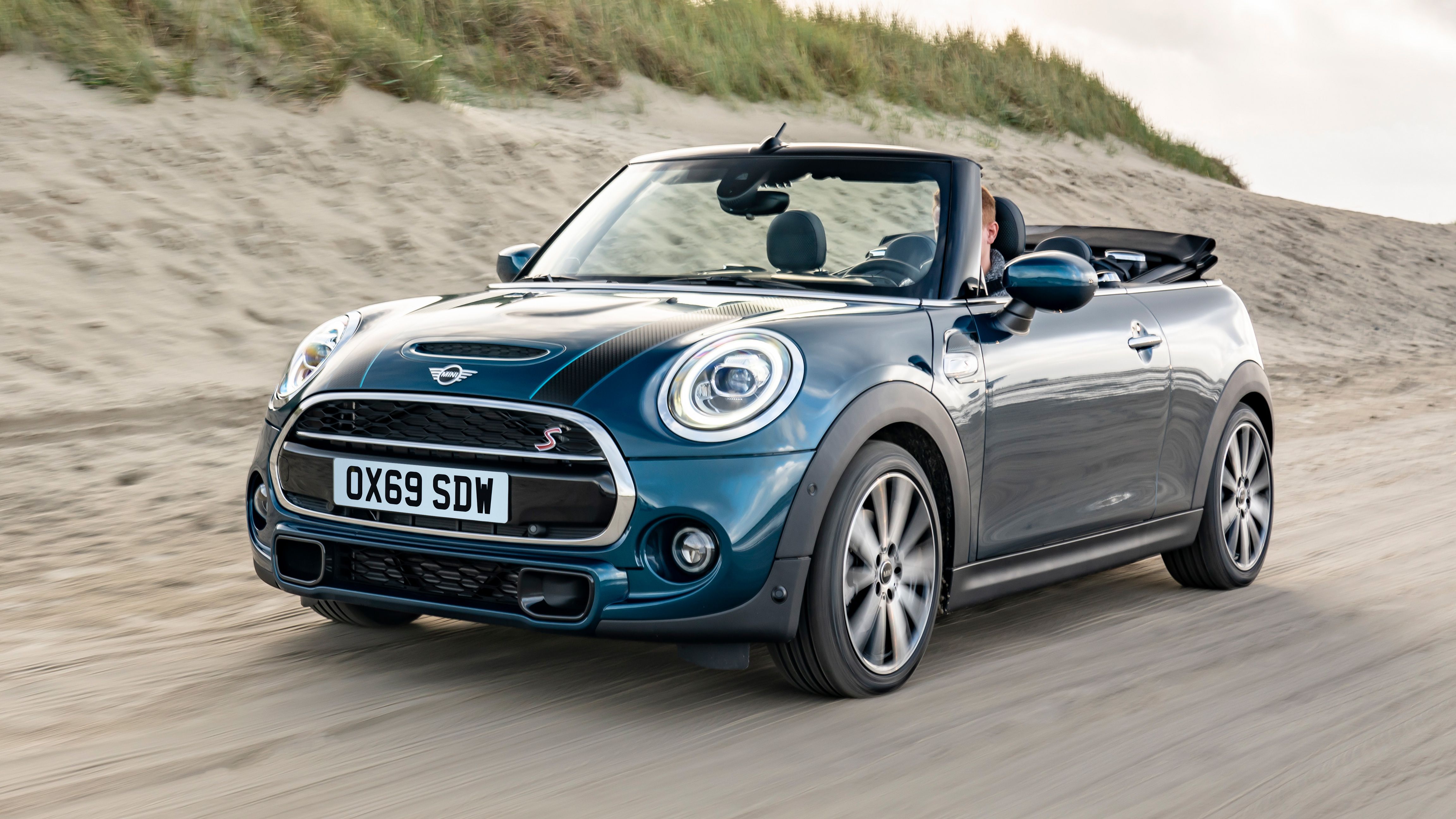 MINI convertible driving front quarter