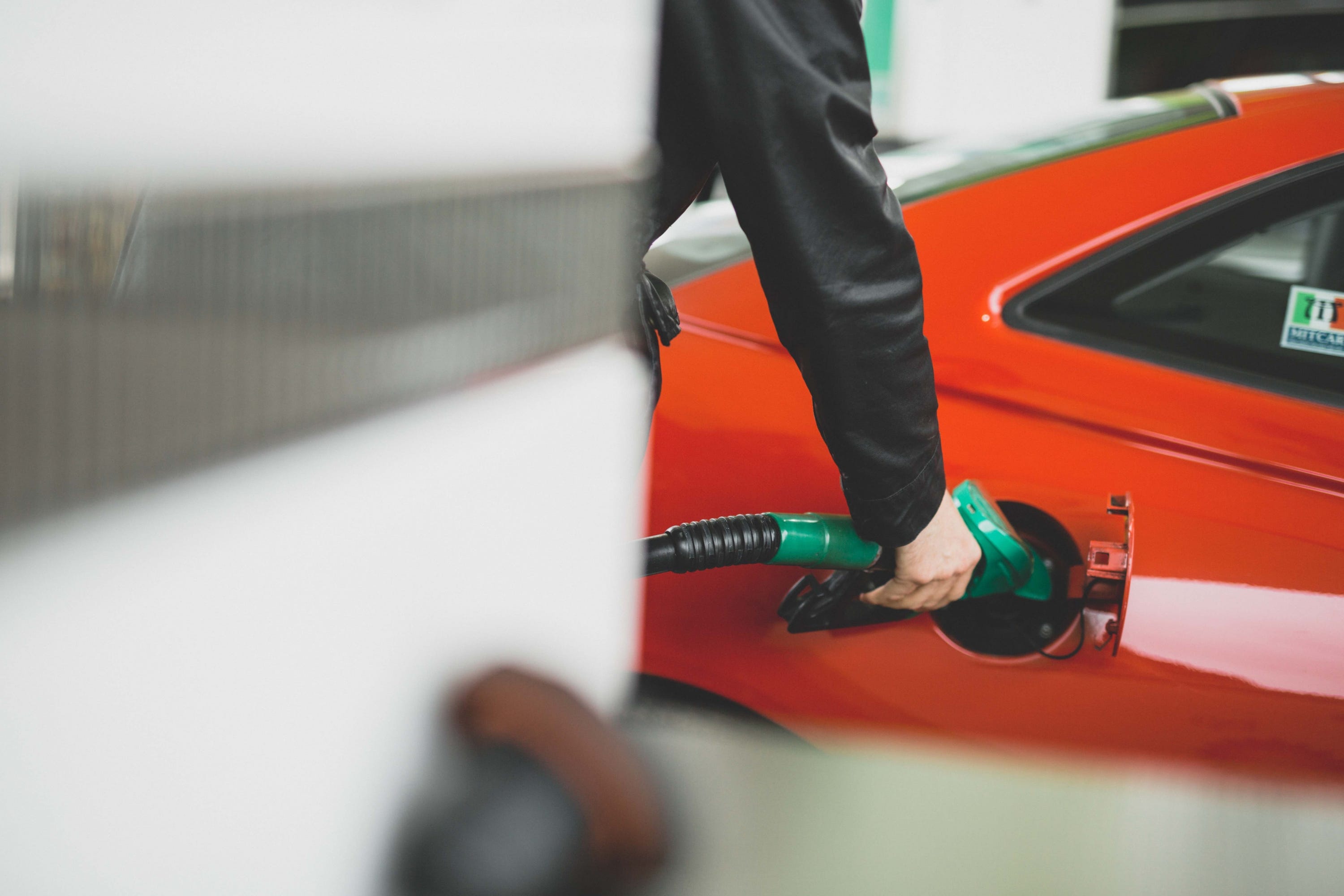 Car being filled up with fuel 