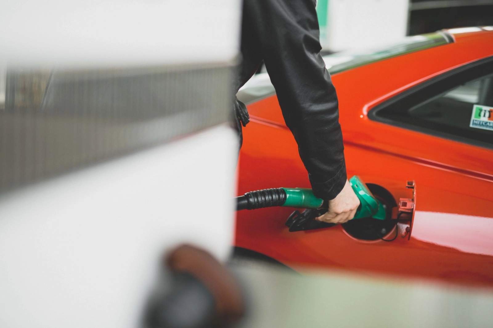 Car being filled up with fuel